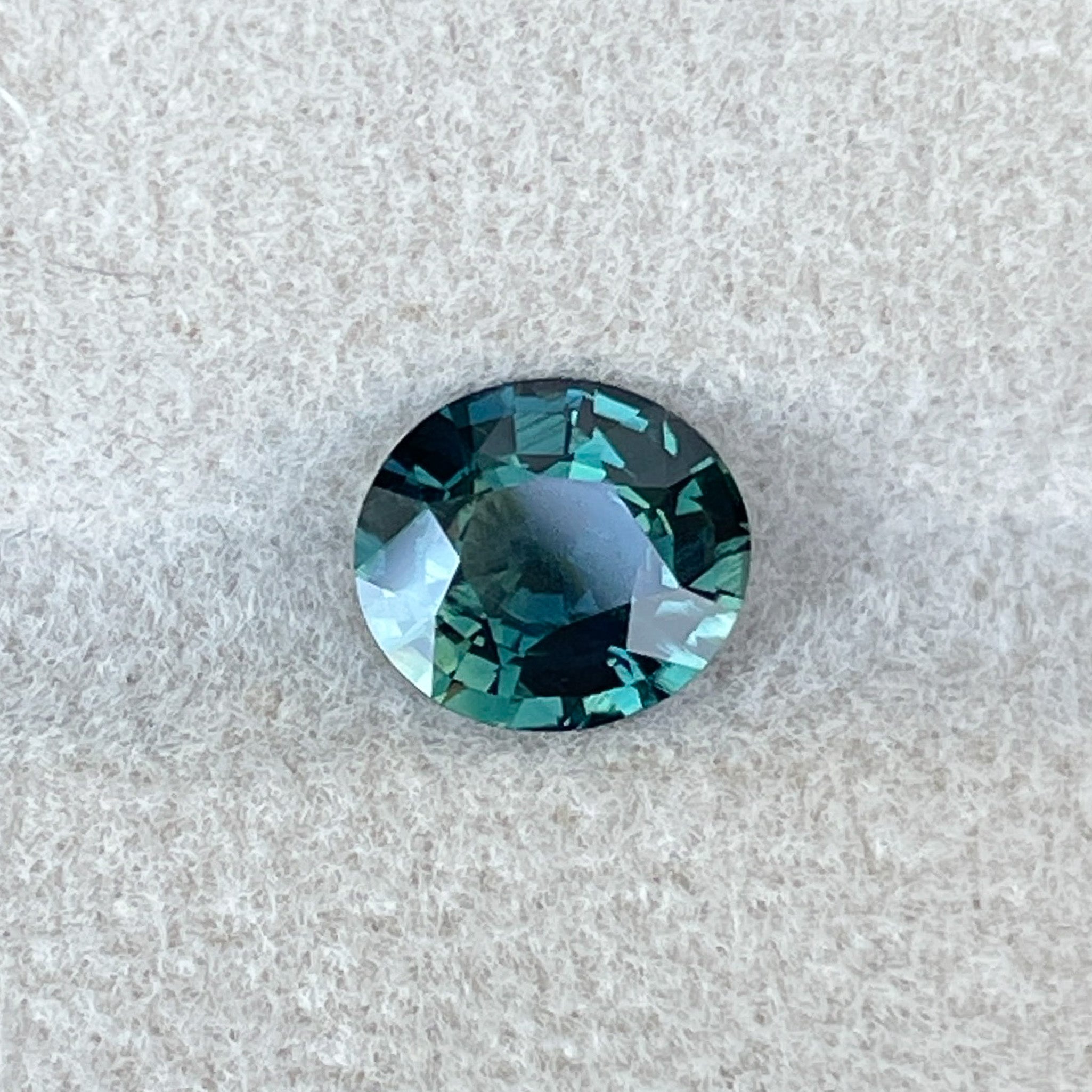Natural forest green sapphire, 1.56 ct oval cut, no heat loose teal gemstone for engagement or custom jewelry from NASHGEMS.