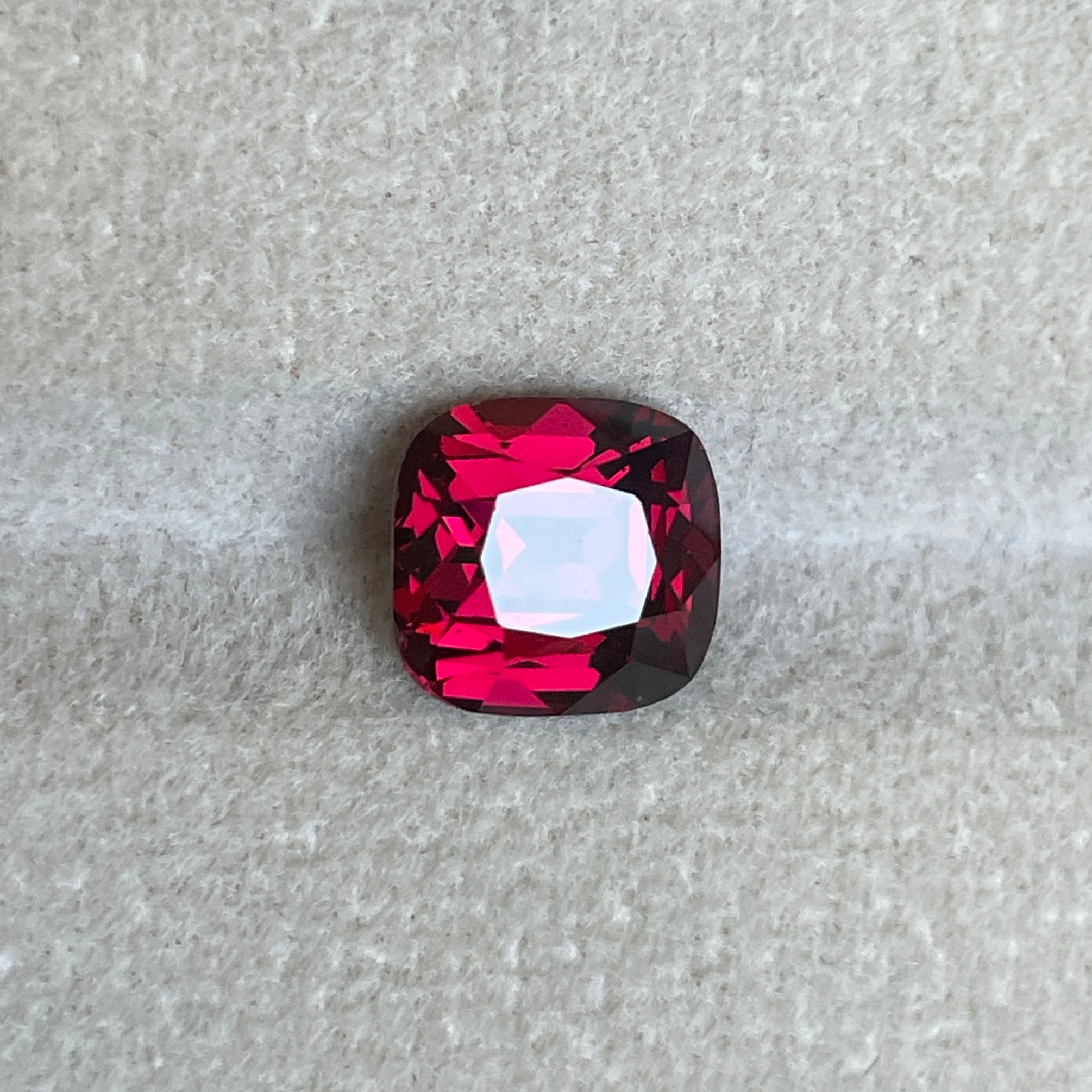 garnet red cushion cut 3.38