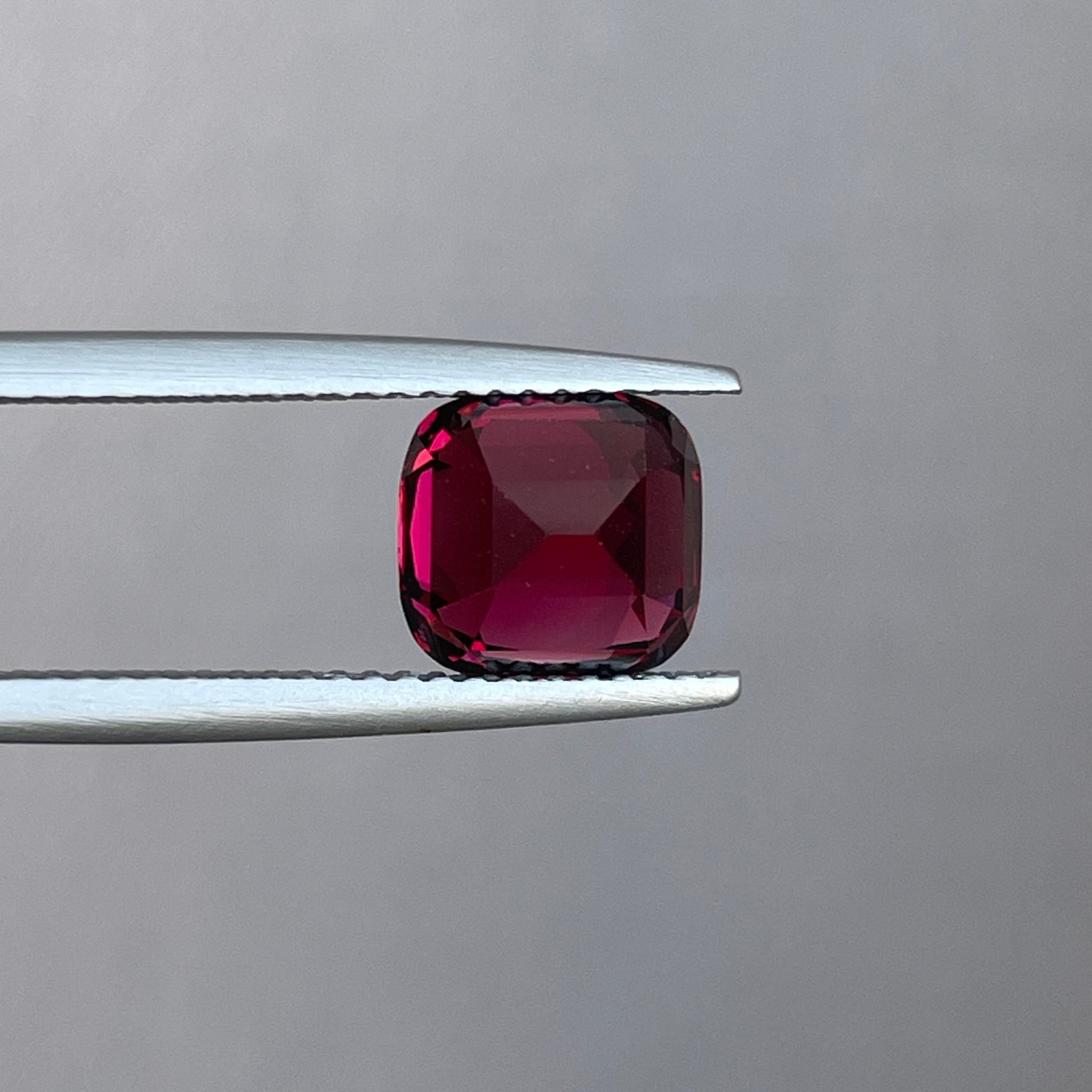 garnet red cushion cut 3.38