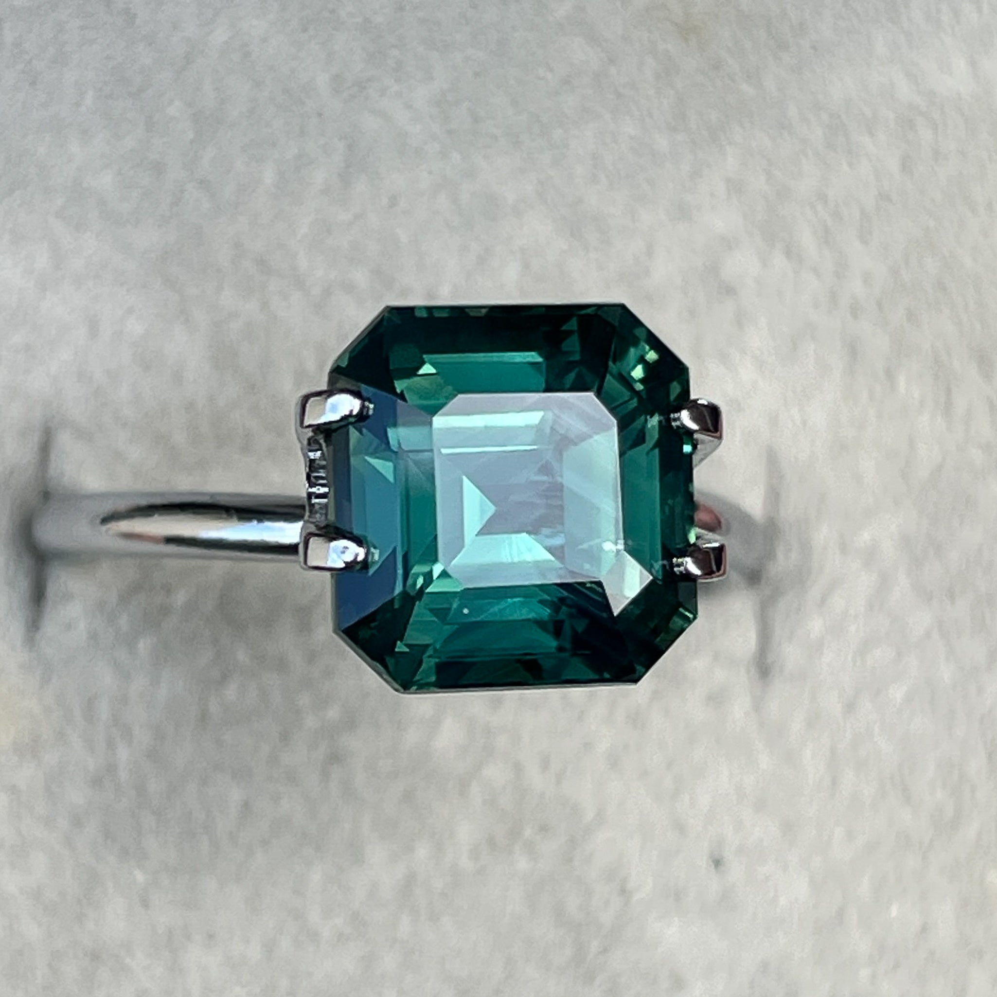 Natural green sapphire 5.08 Ct Asscher emerald cut, teal loose gemstone from NASHGEMS, ideal for engagement rings or custom jewelry.