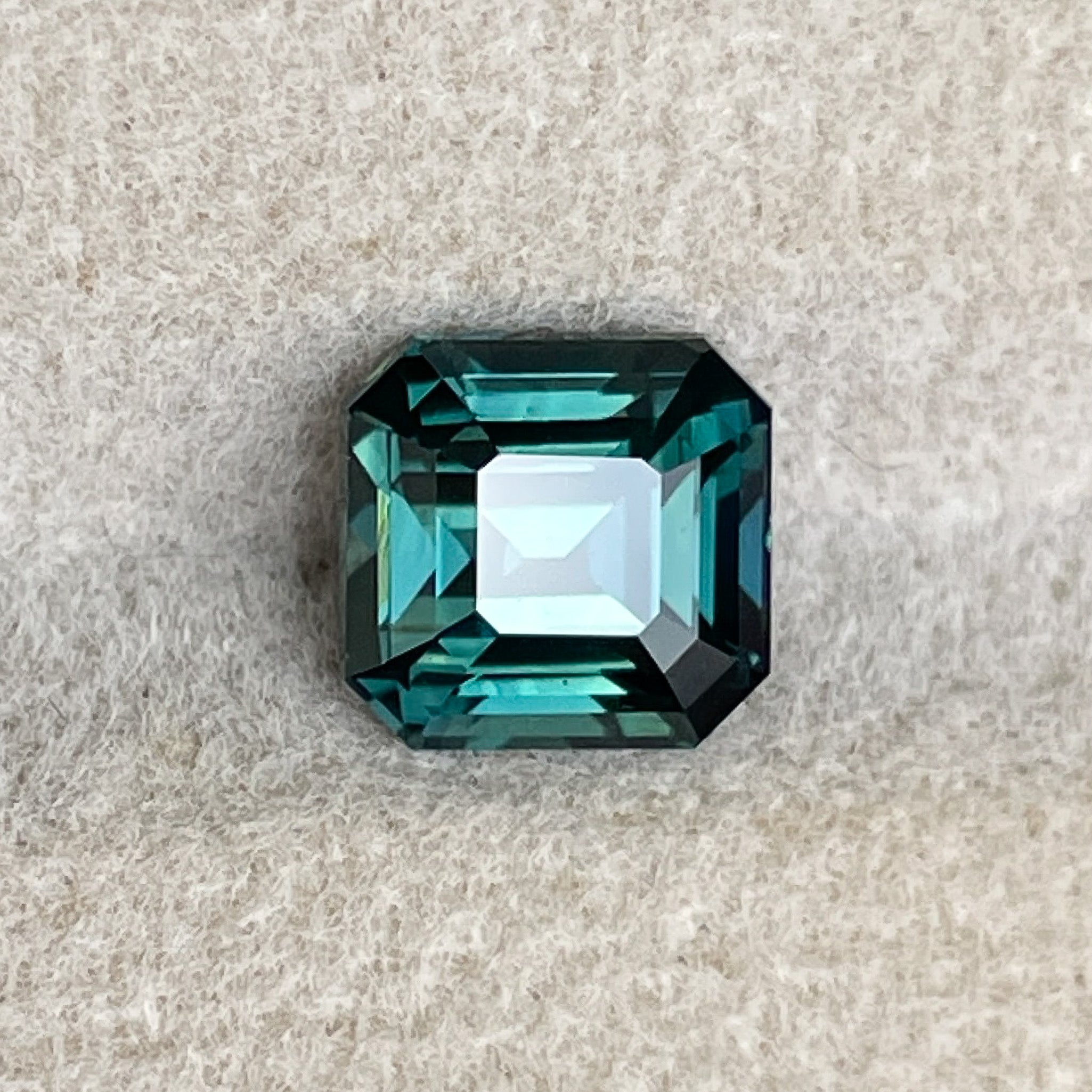 Teal green sapphire loose gemstone, 2.02 Ct emerald cut, heat treated for custom engagement rings, by NASHGEMS.