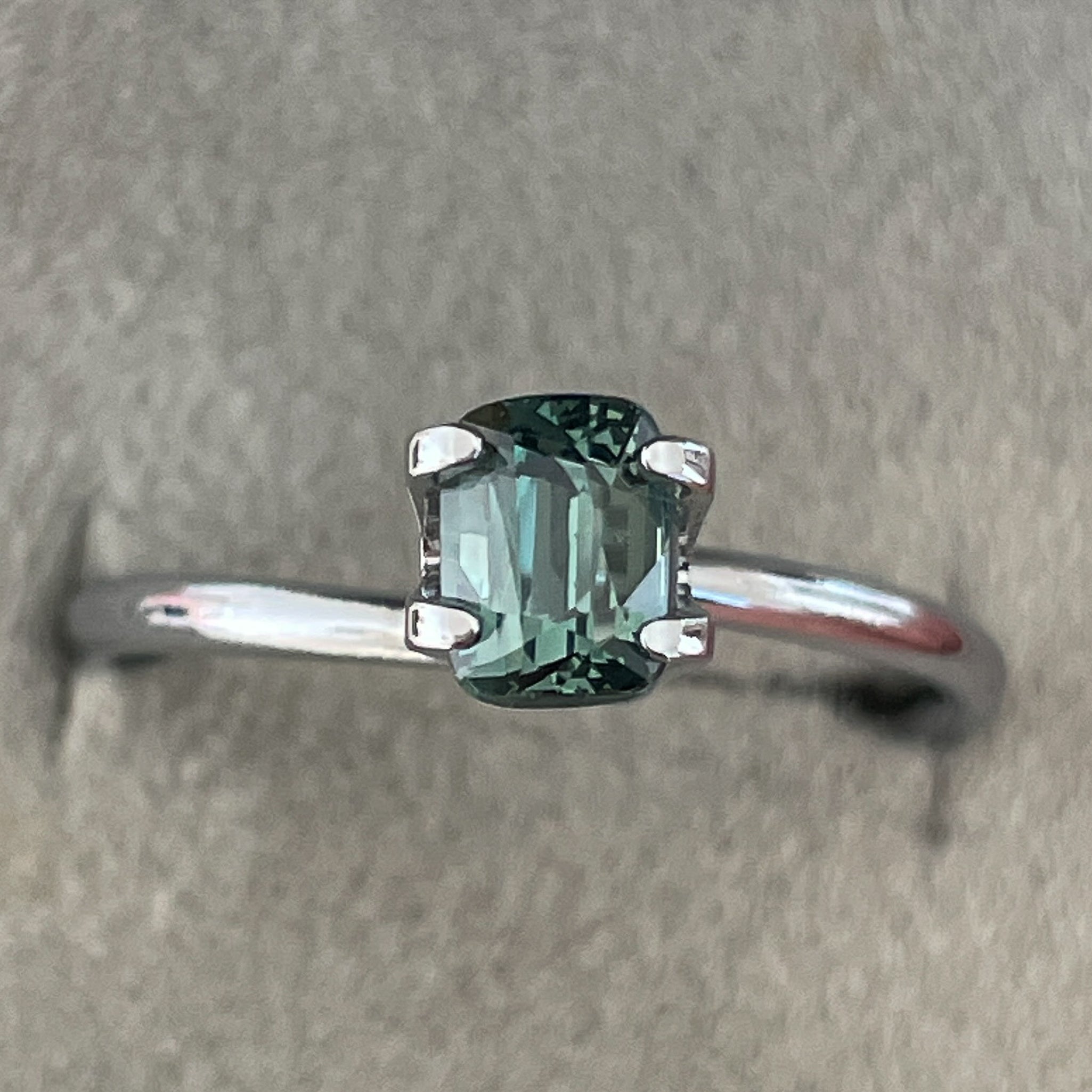Natural teal green sapphire 1.03 Ct cushion cut loose gemstone by NASHGEMS, ideal for engagement rings or custom jewelry designs.