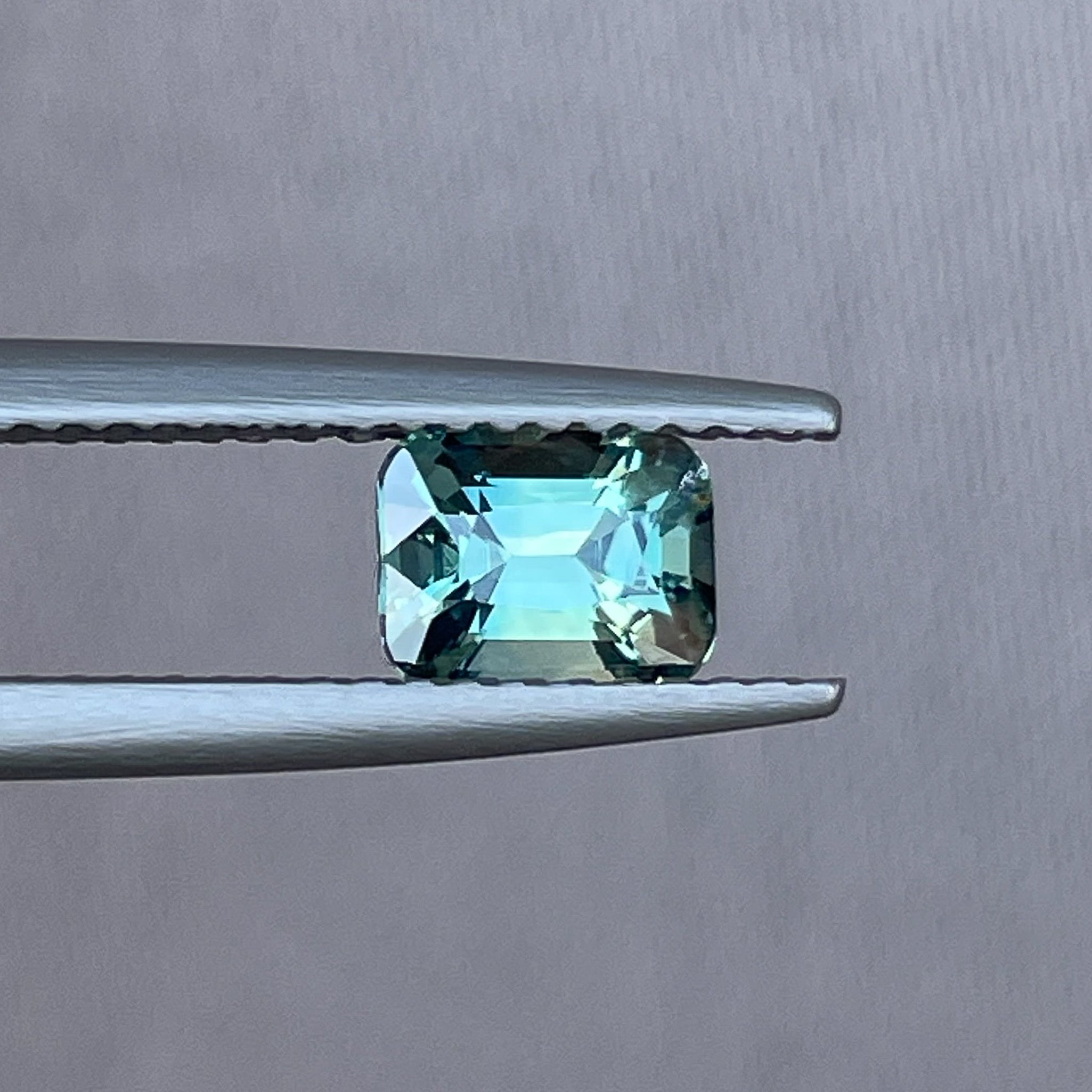Natural teal green sapphire loose gemstone, 1.11 Ct cushion cut by NASHGEMS, ideal for engagement rings or custom jewelry.