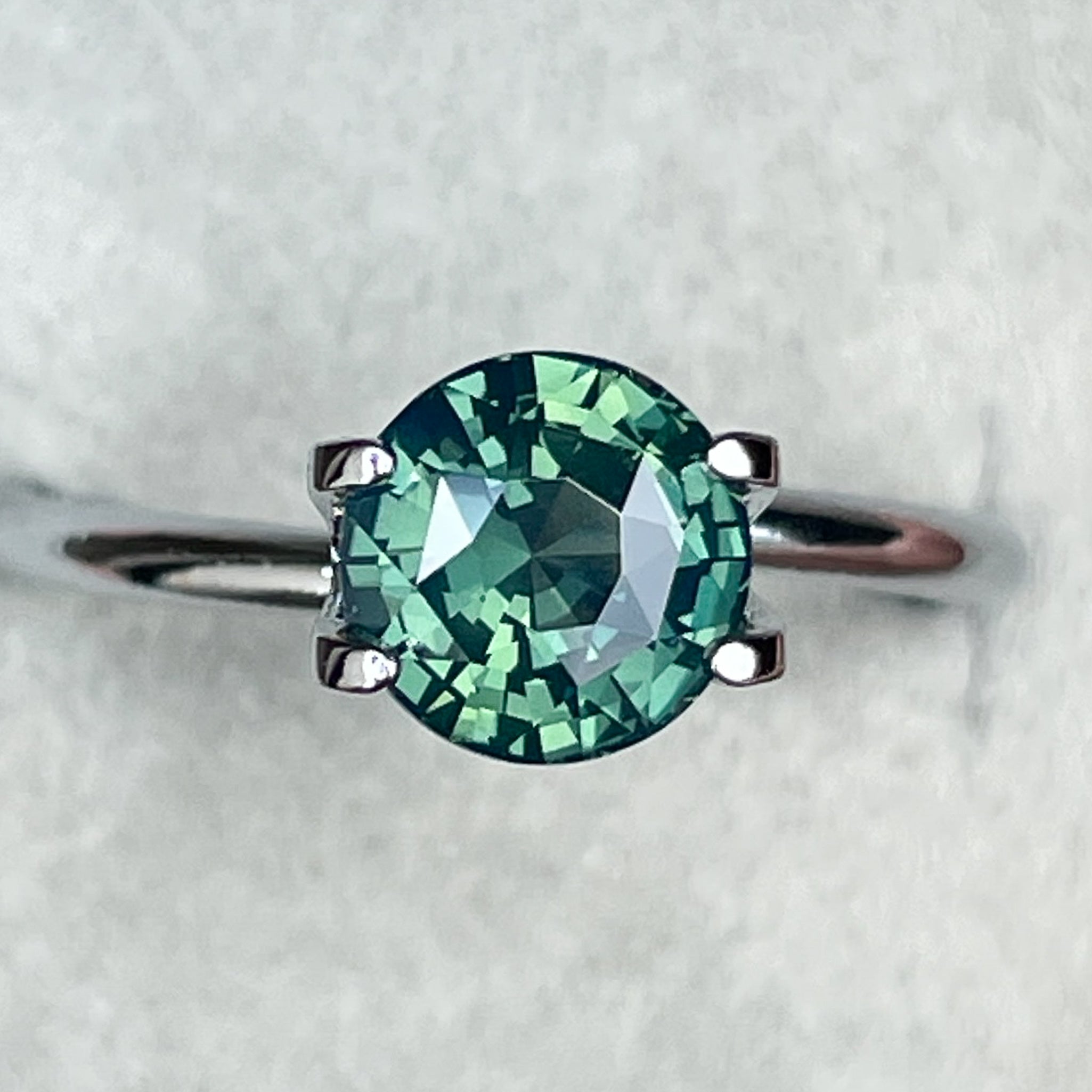 Teal natural forest green sapphire 1.83 Ct round cut, loose no-heat sapphire by NASHGEMS for engagement or custom jewelry.