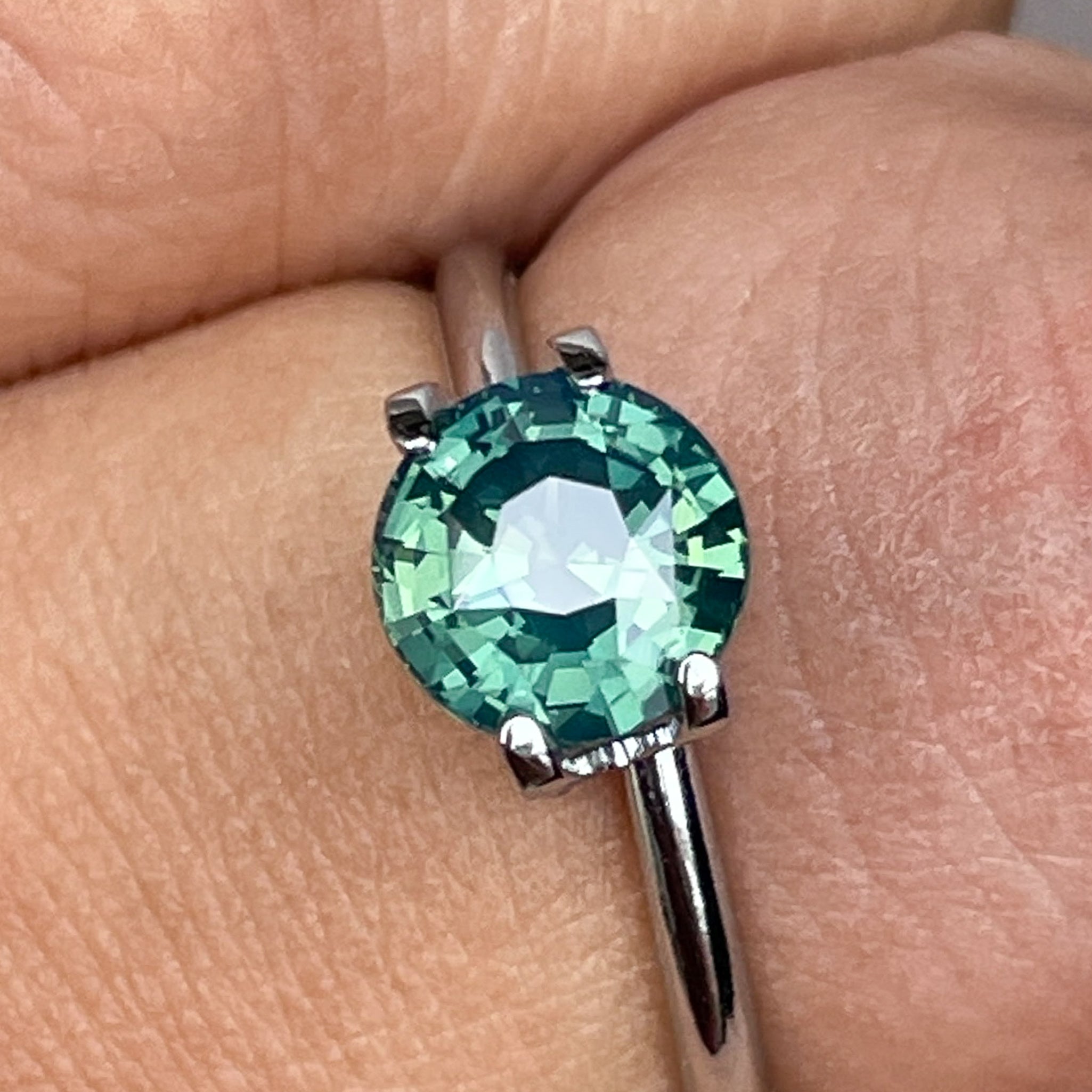Natural forest green sapphire, 1.83 ct round cut teal loose gemstone by NASHGEMS, ideal for engagement rings or custom jewelry.