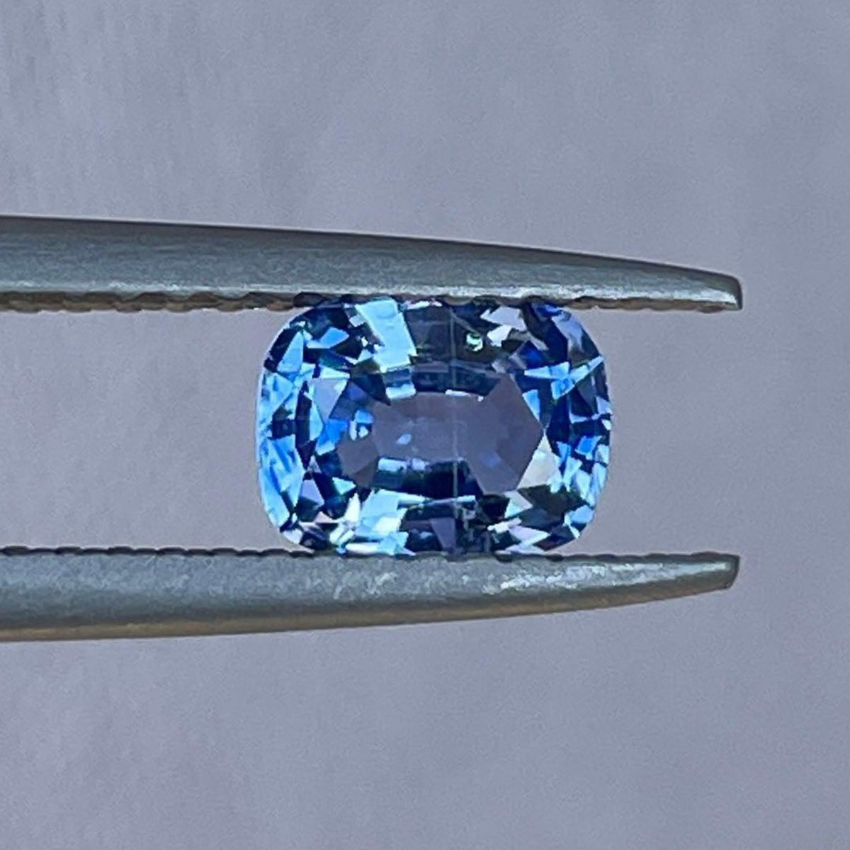 Light blue Ceylon sapphire gemstone from NASHGEMS, 0.74 carats, set in elegant women's birthstone jewelry, perfect for engagement rings.