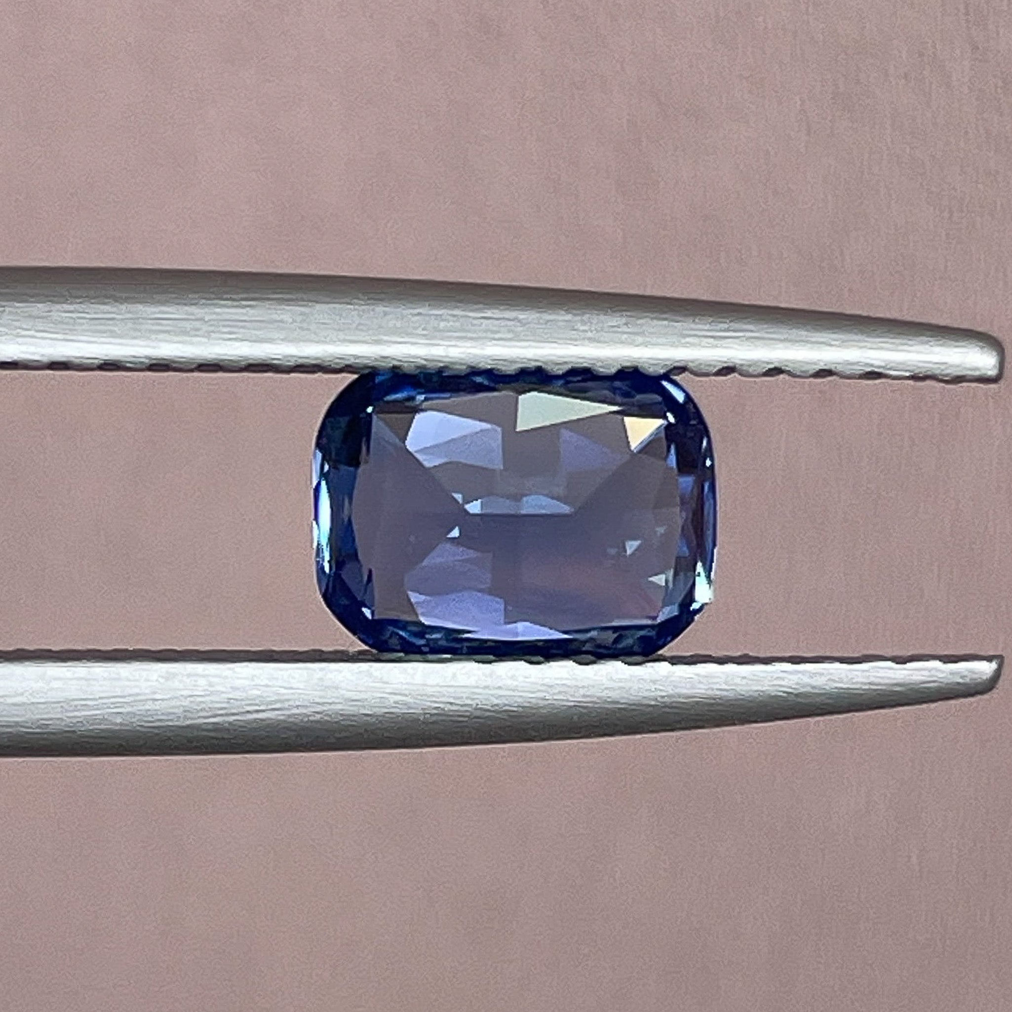 Natural Ceylon Blue Sapphire 1.60 Ct cushion cut loose gemstone by NASHGEMS, vivid blue sapphire for engagement or custom jewelry.