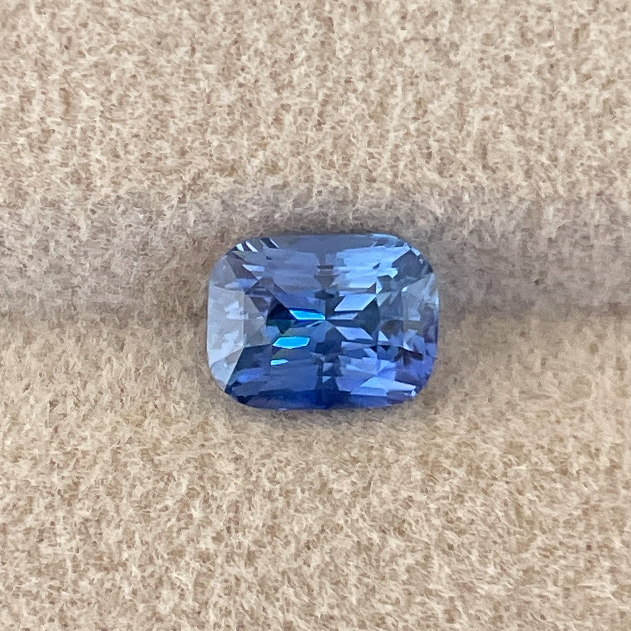 Natural Ceylon Blue Sapphire 1.60 Ct cushion cut, vivid blue loose gemstone by NASHGEMS for engagement or custom jewelry.