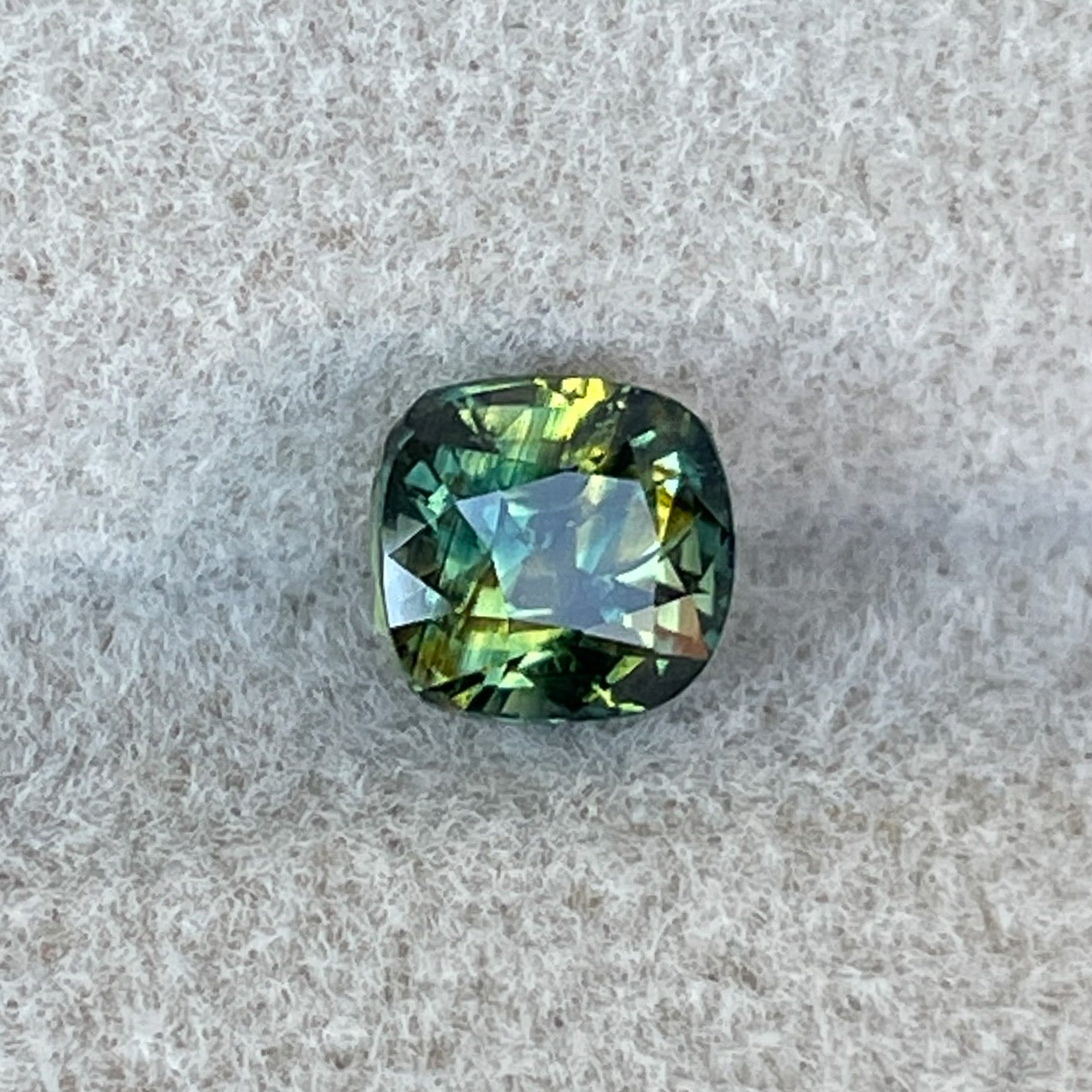 Teal Australian Parti Sapphire 1.10 Ct cushion cut loose gemstone by NASHGEMS, ideal for engagement rings or custom jewelry.