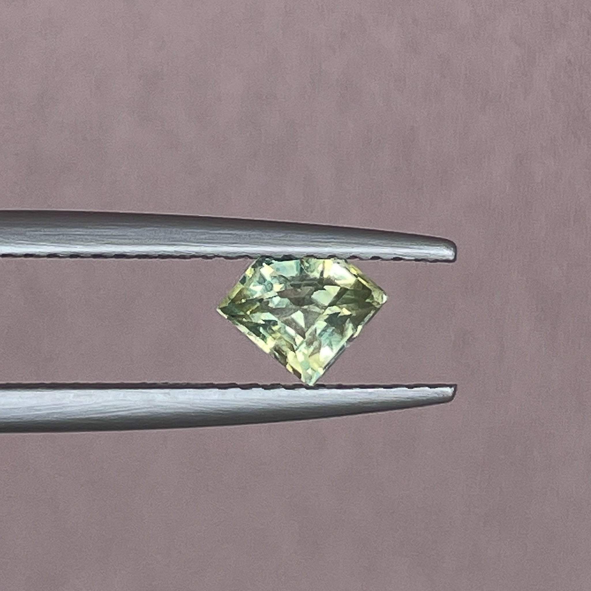 Natural pale green yellow sapphire, 0.72 ct shield cut teal sapphire by NASHGEMS, loose gemstone for engagement or custom jewelry.