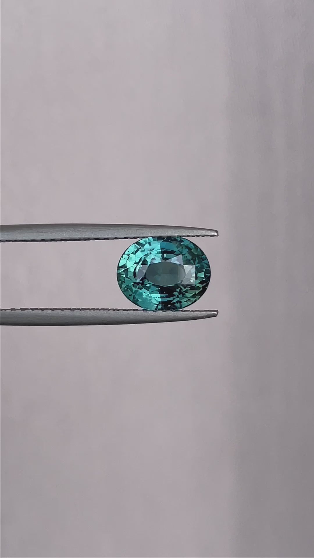 teal blue green parti sapphire oval cut gem