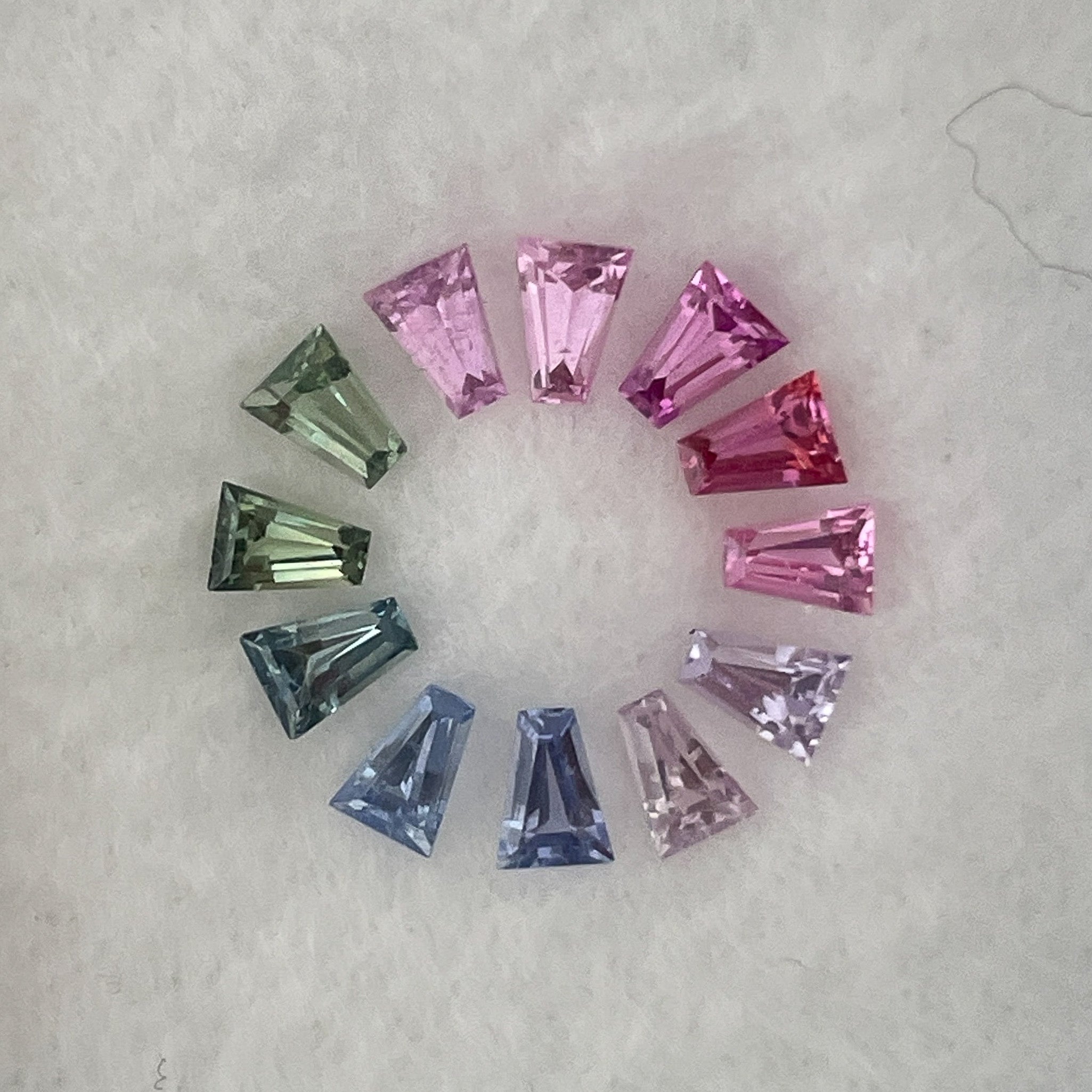 Natural rainbow sapphire lot with 1.37 carats of multi-colored loose sapphires for custom jewelry by NASHGEMS.