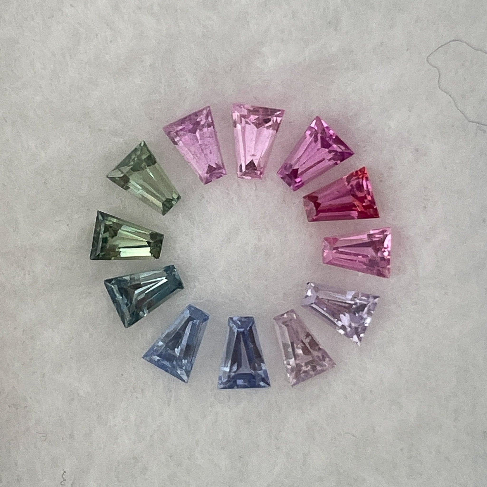 Natural rainbow sapphire lot with 1.37 ct of multi-colored loose sapphires for custom jewelry by NASHGEMS.