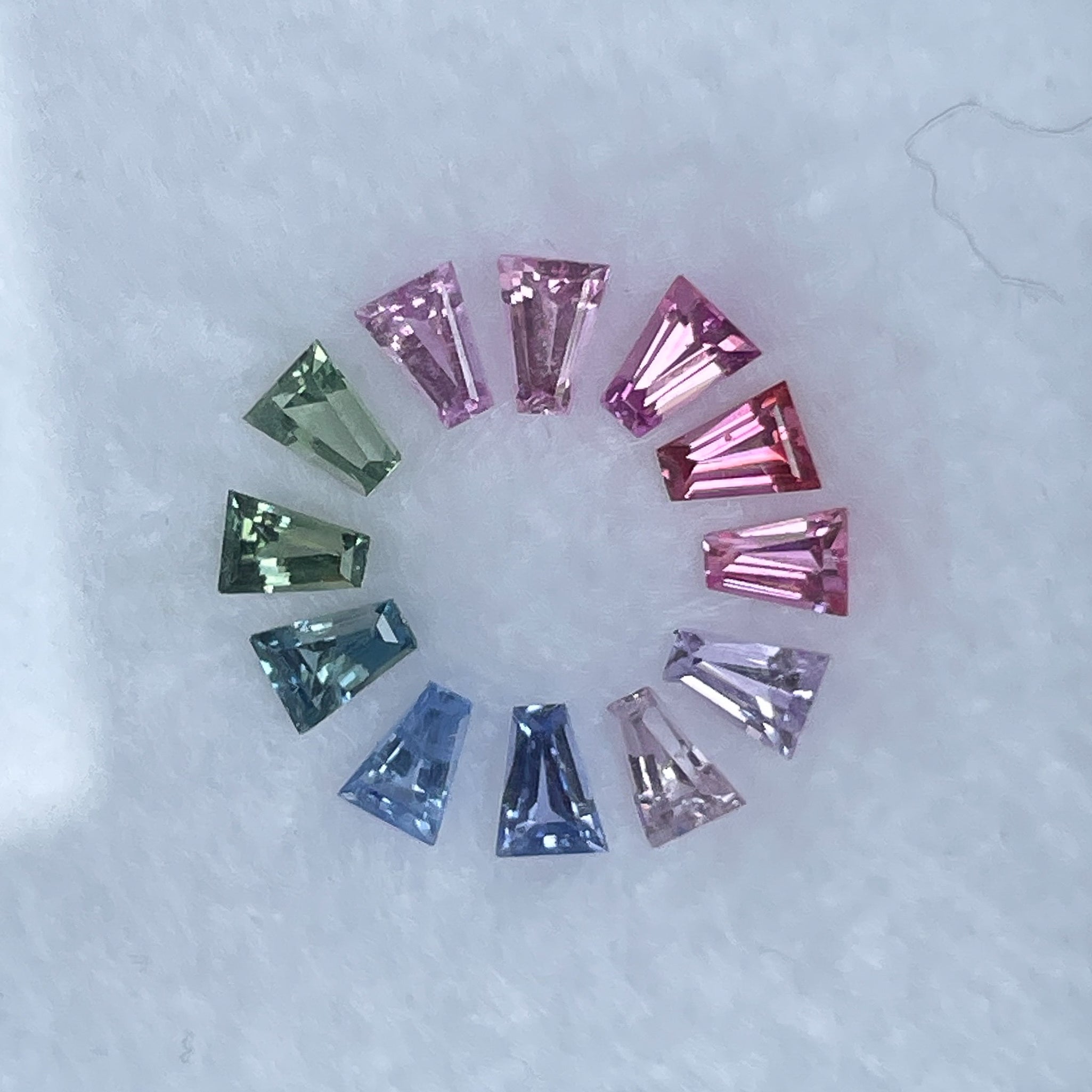 Natural Rainbow Sapphire lot weighing 1.37 ct, featuring multi-colored loose sapphires ideal for custom jewelry.