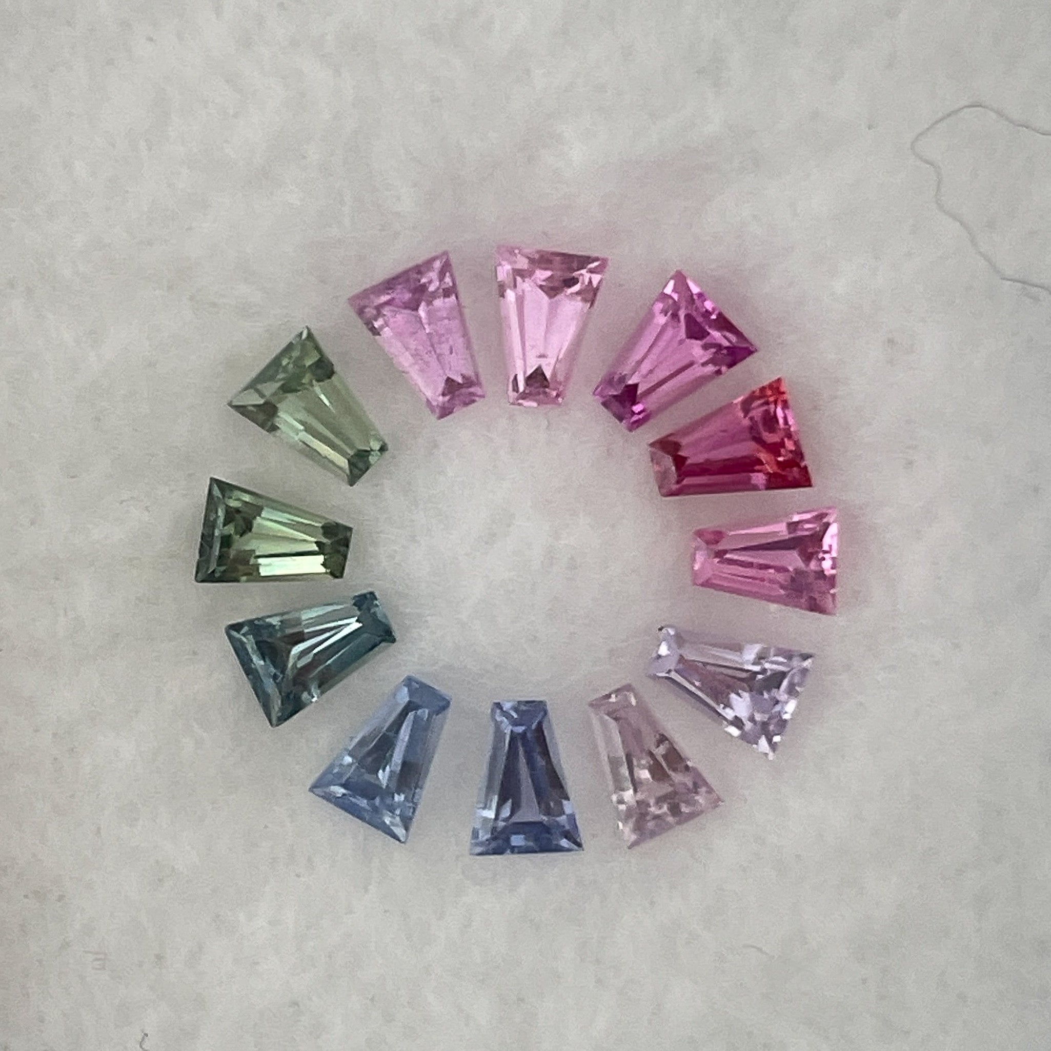 Natural rainbow sapphire lot with 1.37 carats of multi-colored loose sapphires for custom jewelry by NASHGEMS.