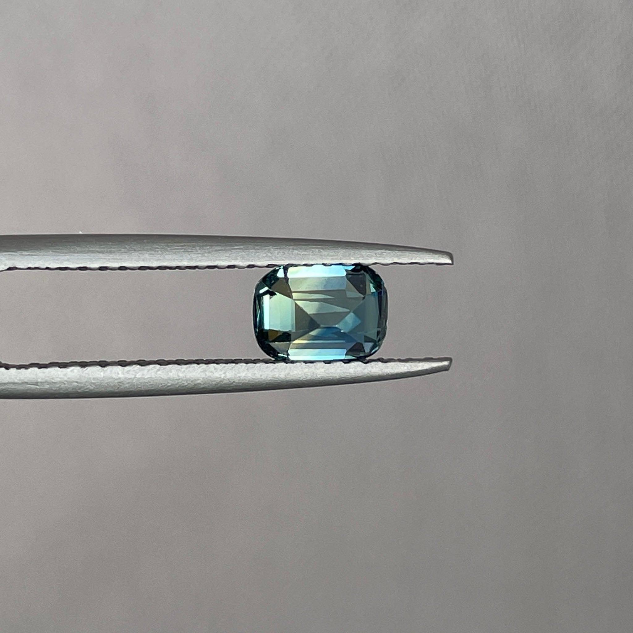 teal blue green parti sapphire cushion cut gem