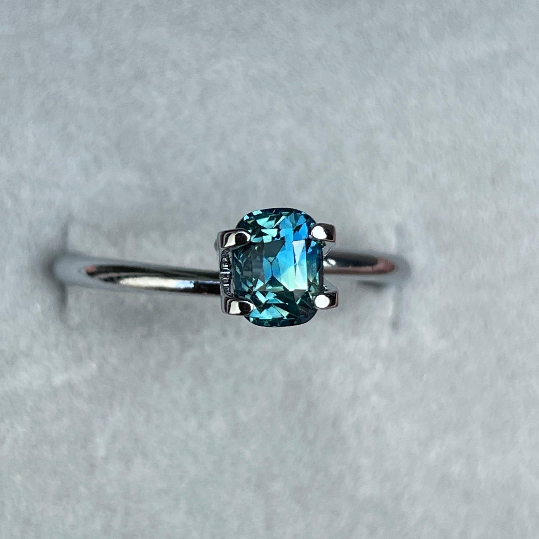 teal blue green parti sapphire cushion cut gem