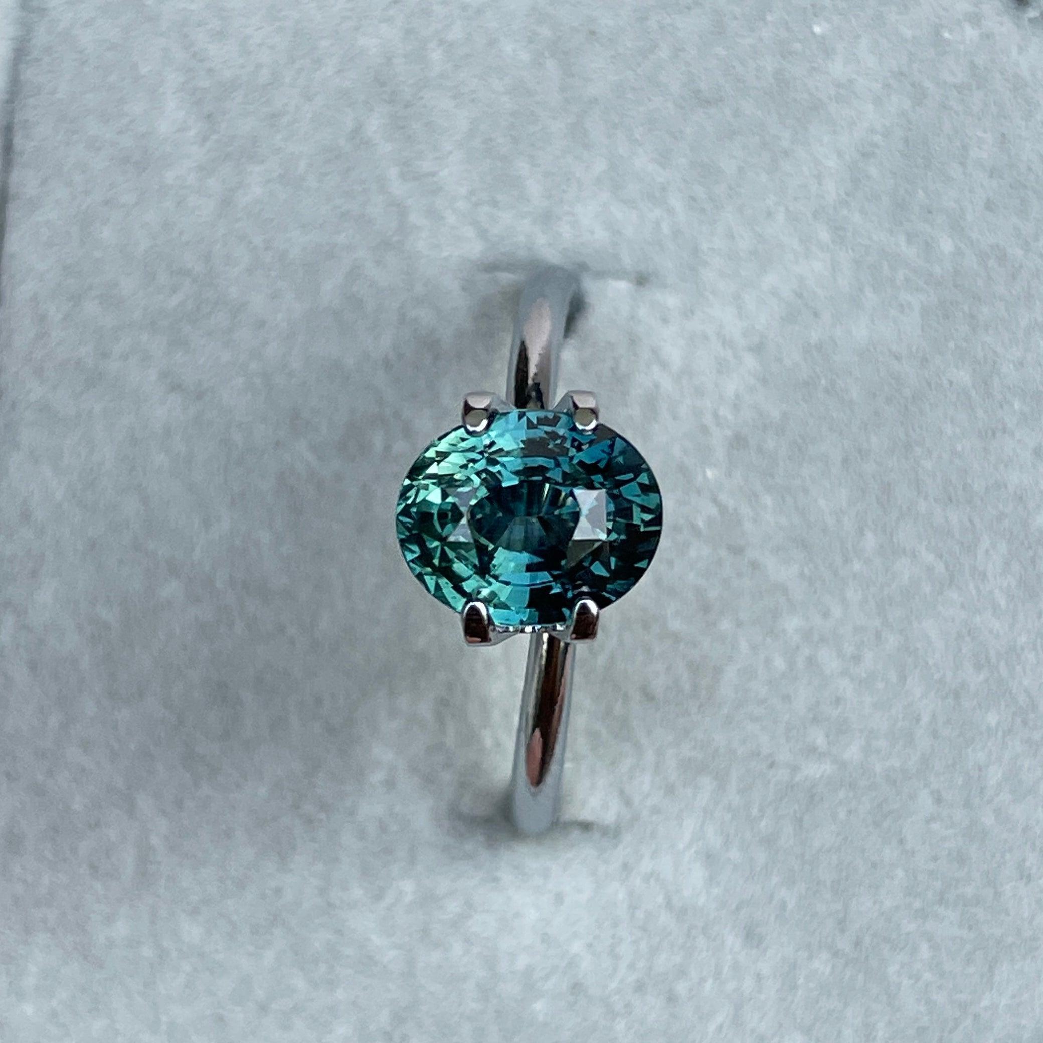 teal blue green parti sapphire oval cut gem