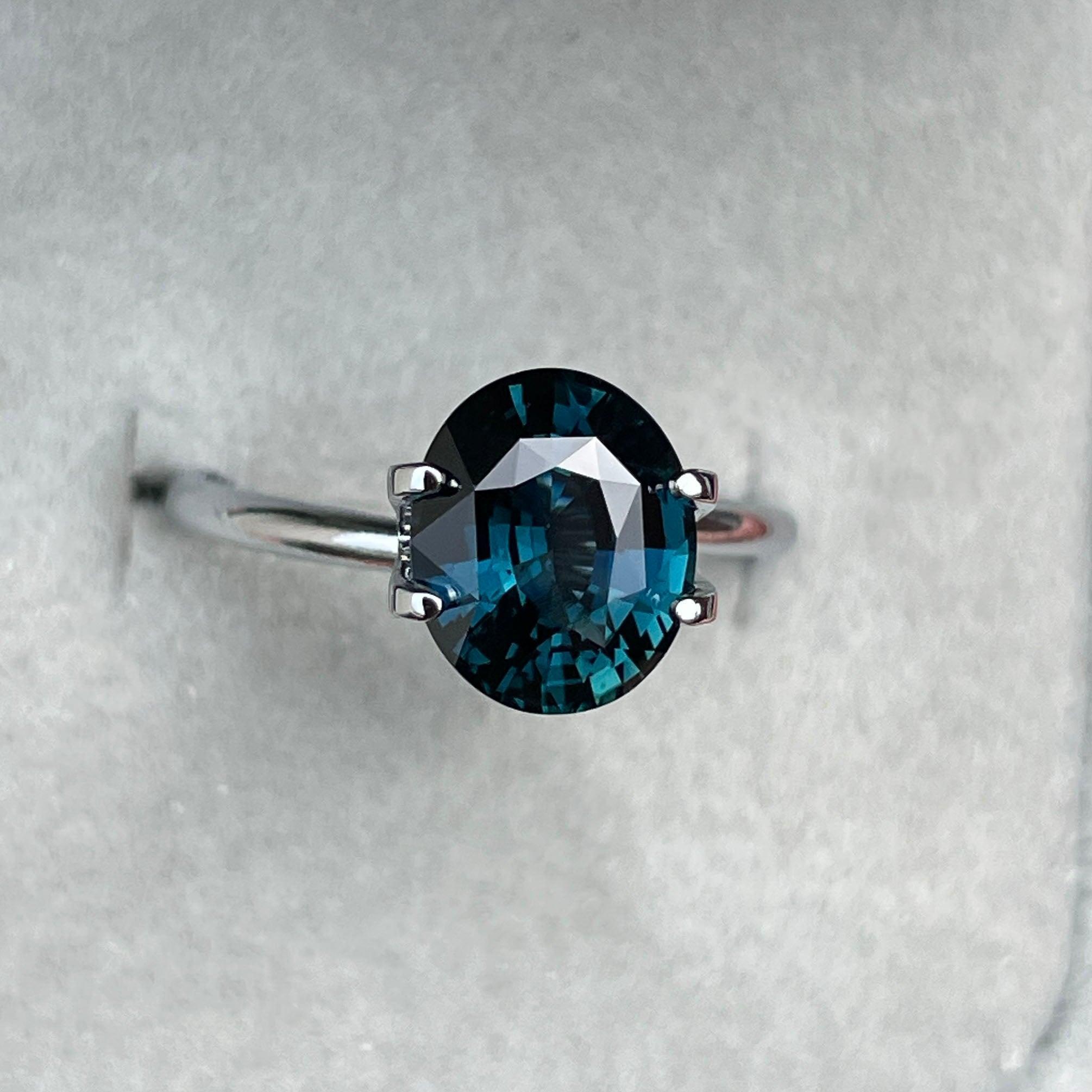 teal blue green parti sapphire oval cut gem