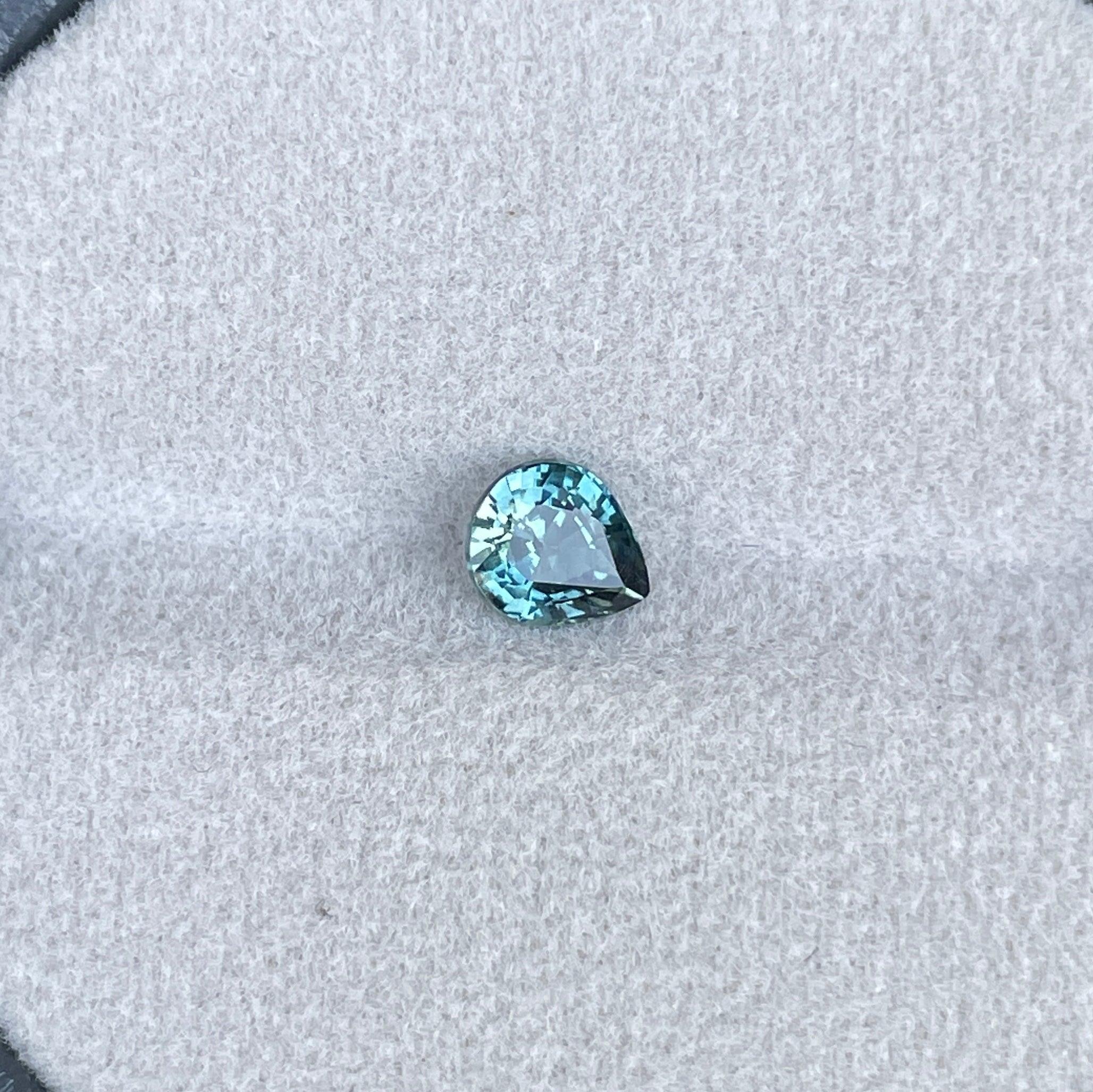 teal blue green parti sapphire pear drop cut gem