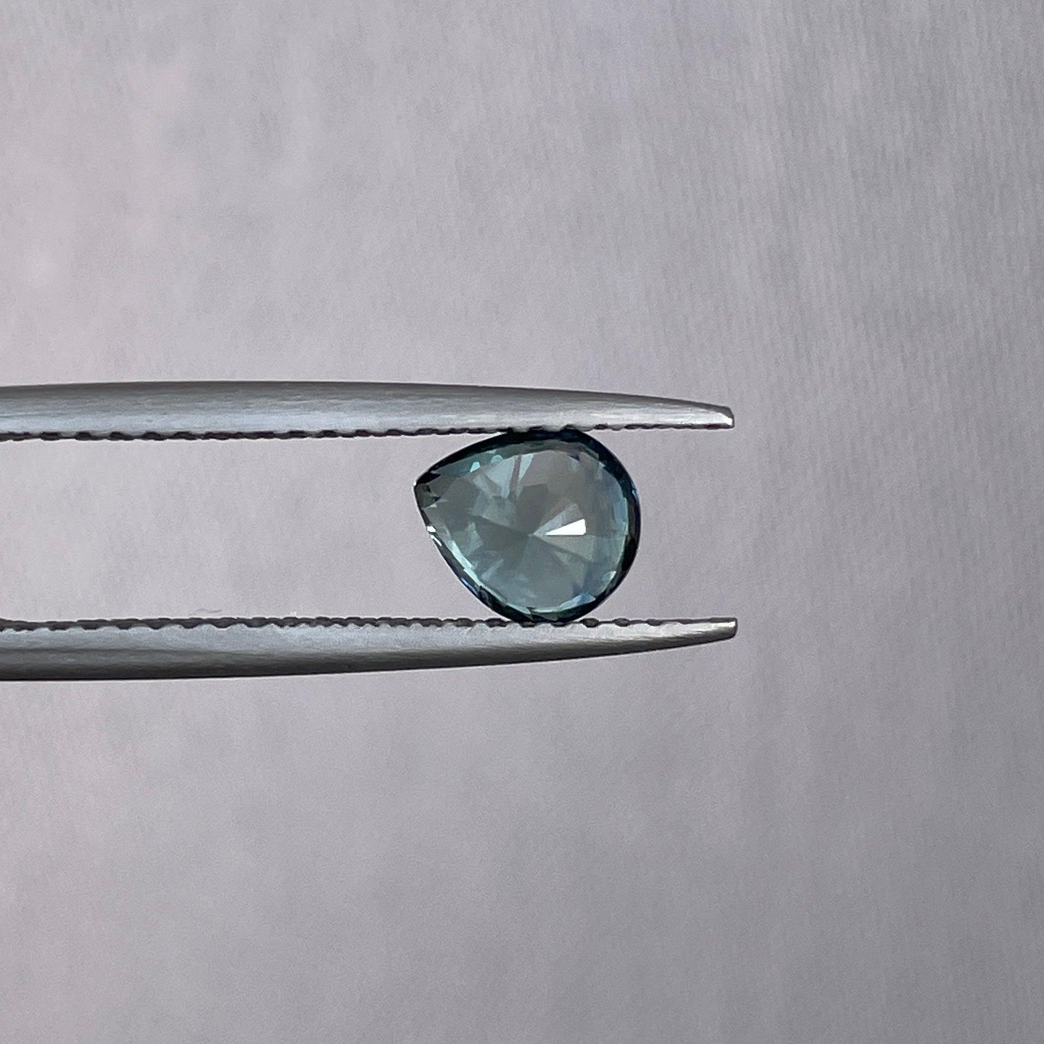 teal blue green parti sapphire pear drop cut gem