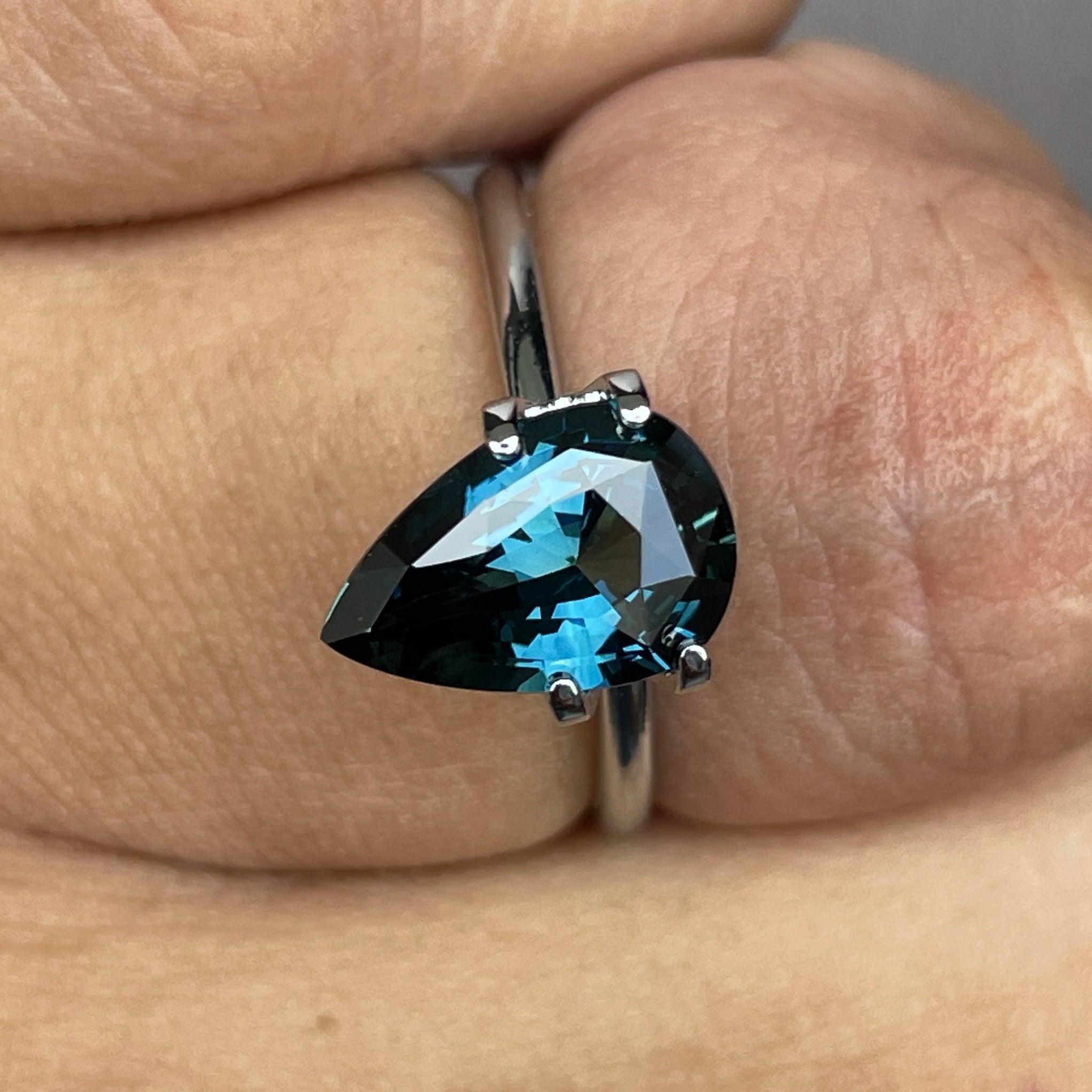 teal blue green parti sapphire pear drop cut gem