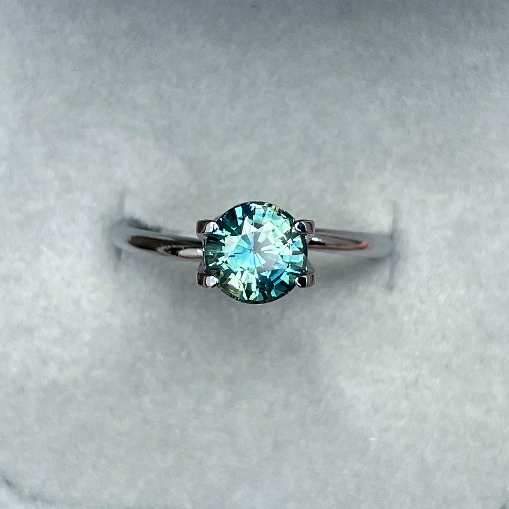 teal blue green parti sapphire round cut gem