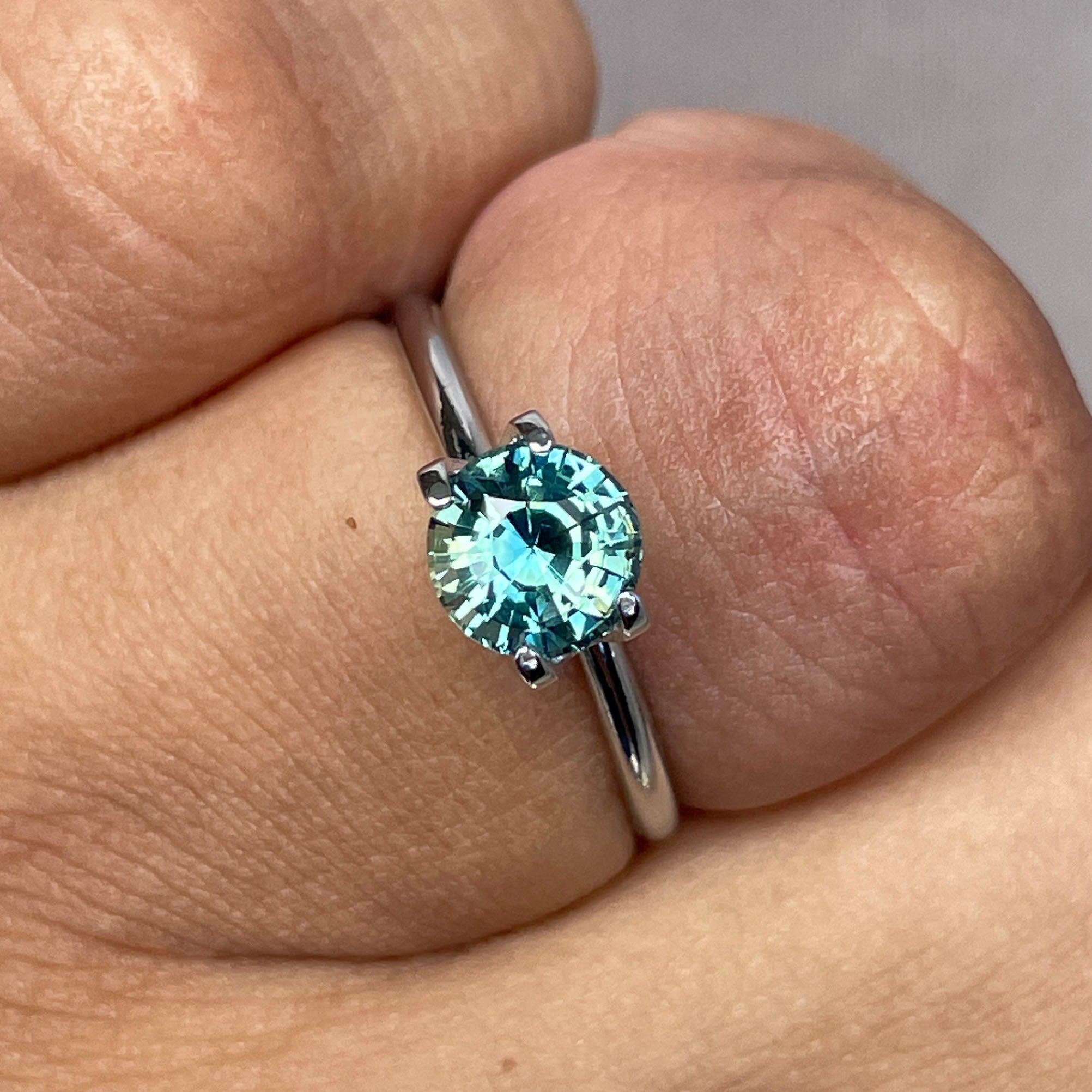 teal blue green parti sapphire round cut gem