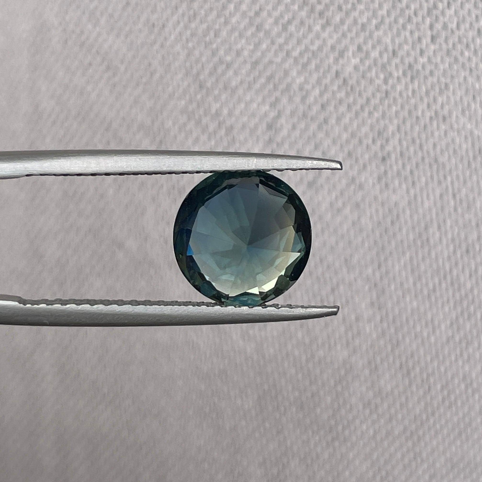 teal blue green parti sapphire round cut gem