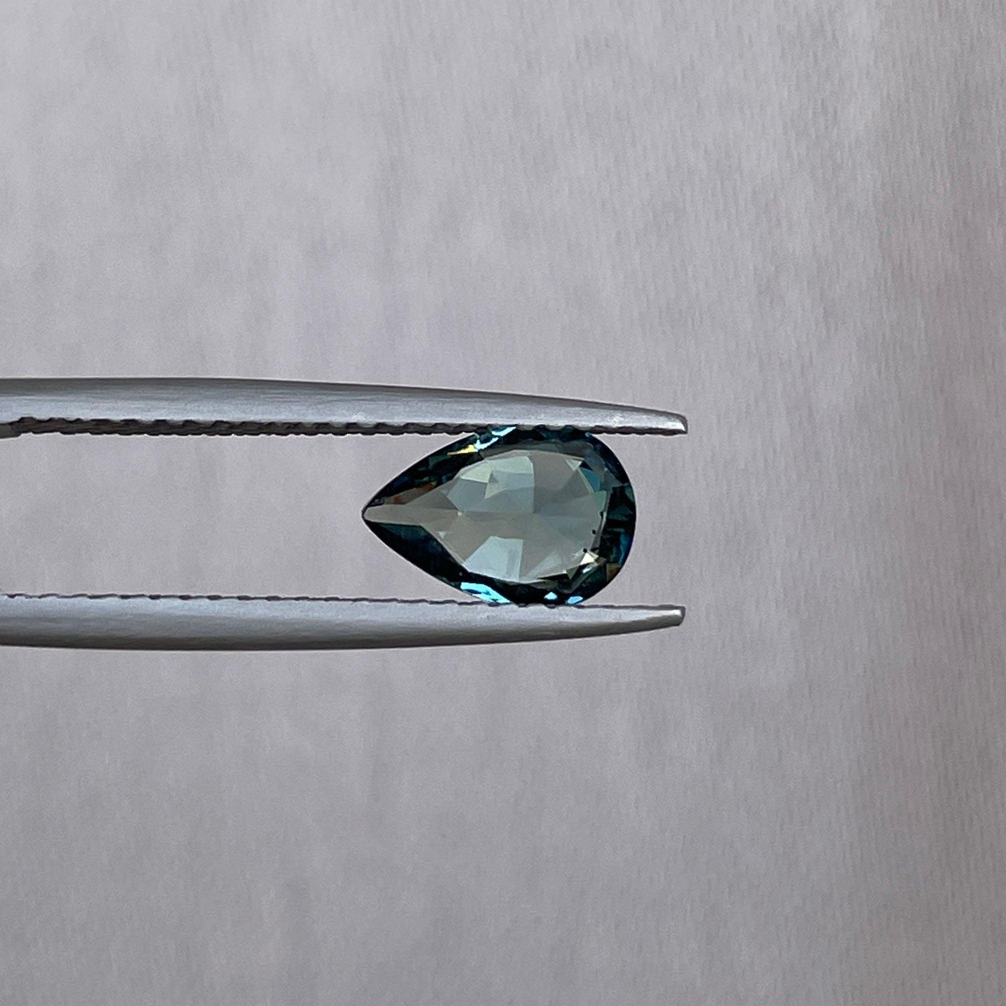 teal sapphire engagement ring