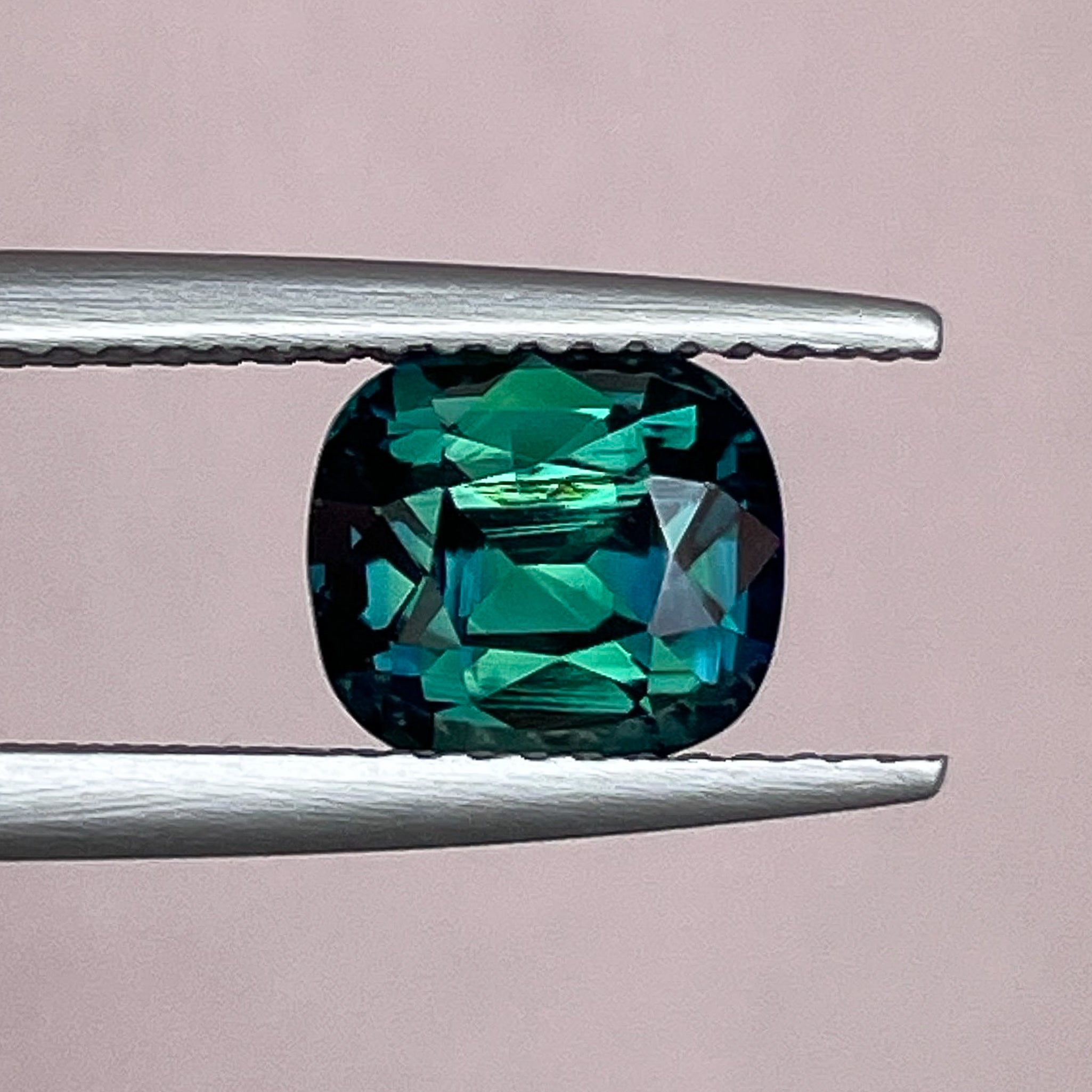 Teal forest green sapphire, 2.56 Ct cushion cut, loose gemstone from NASHGEMS, ideal for engagement or custom jewelry.