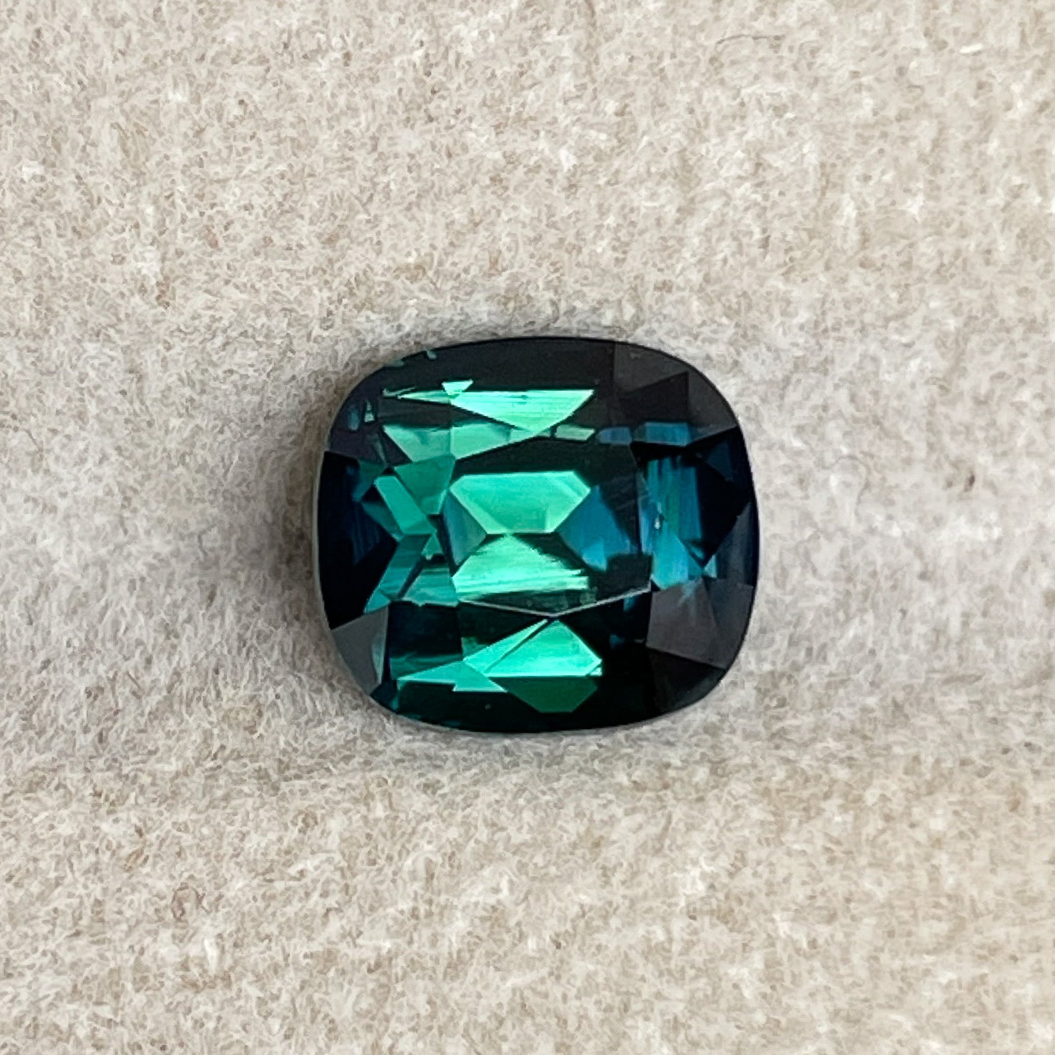 Natural forest green sapphire, 2.56 Ct cushion cut teal blue-green loose gemstone by NASHGEMS, perfect for engagement or custom jewelry.