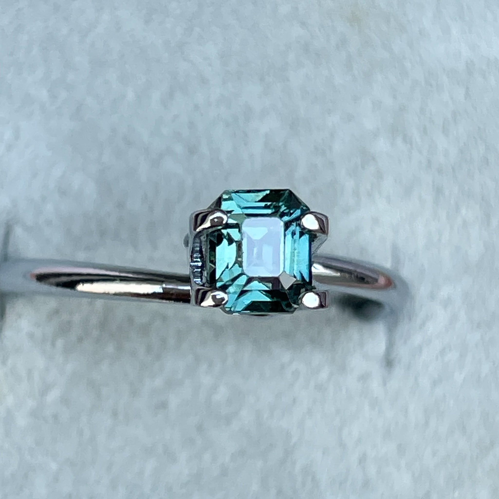 Natural teal sapphire loose stone, 1.05 Ct emerald cut by NASHGEMS, ideal for engagement rings or custom jewelry.
