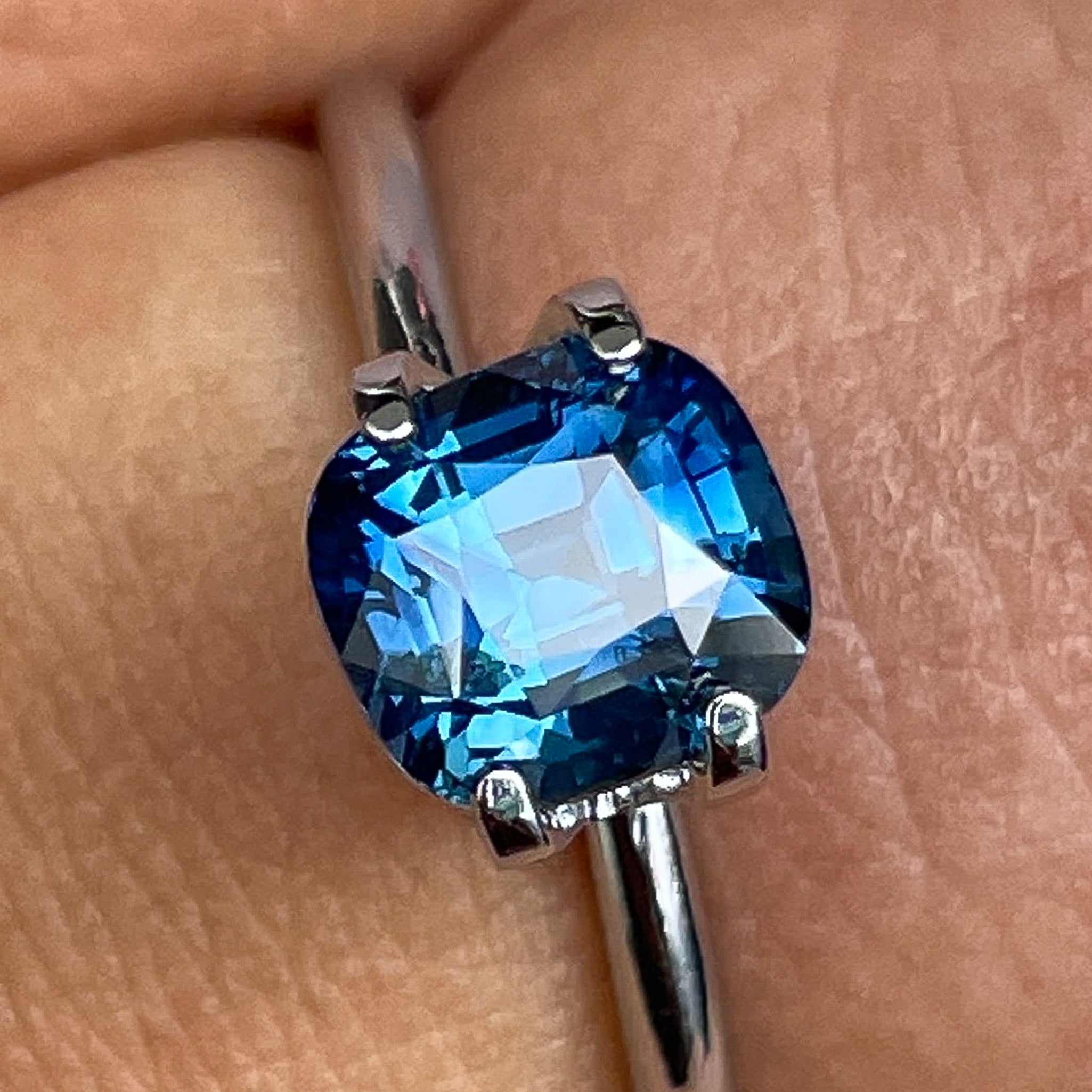 Natural teal blue sapphire 2.07 ct cushion cut loose gemstone by NASHGEMS, ideal for engagement rings or custom jewelry.