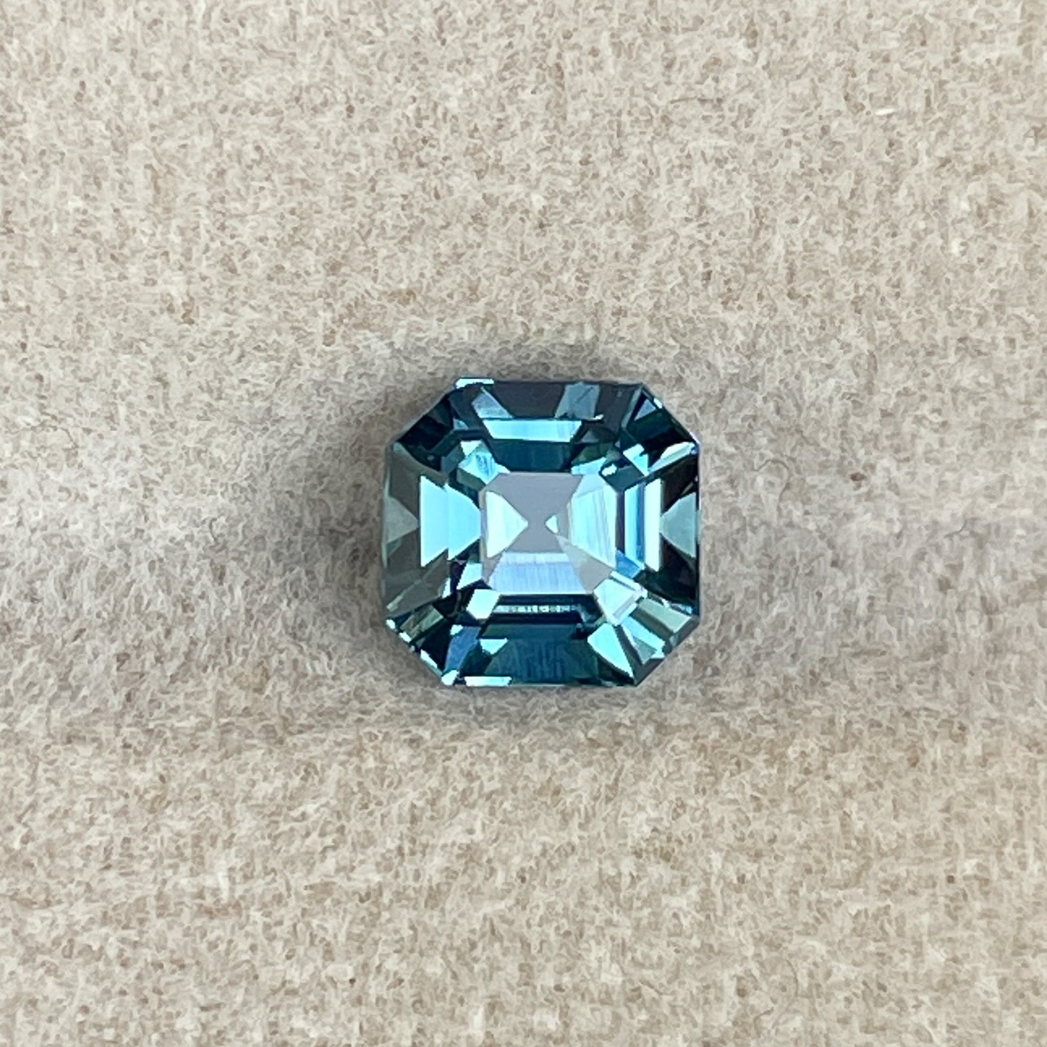 Natural teal sapphire 1.76 Ct Asscher octagon cut by NASHGEMS, heat-treated loose teal gemstone for jewelry or engagement rings.