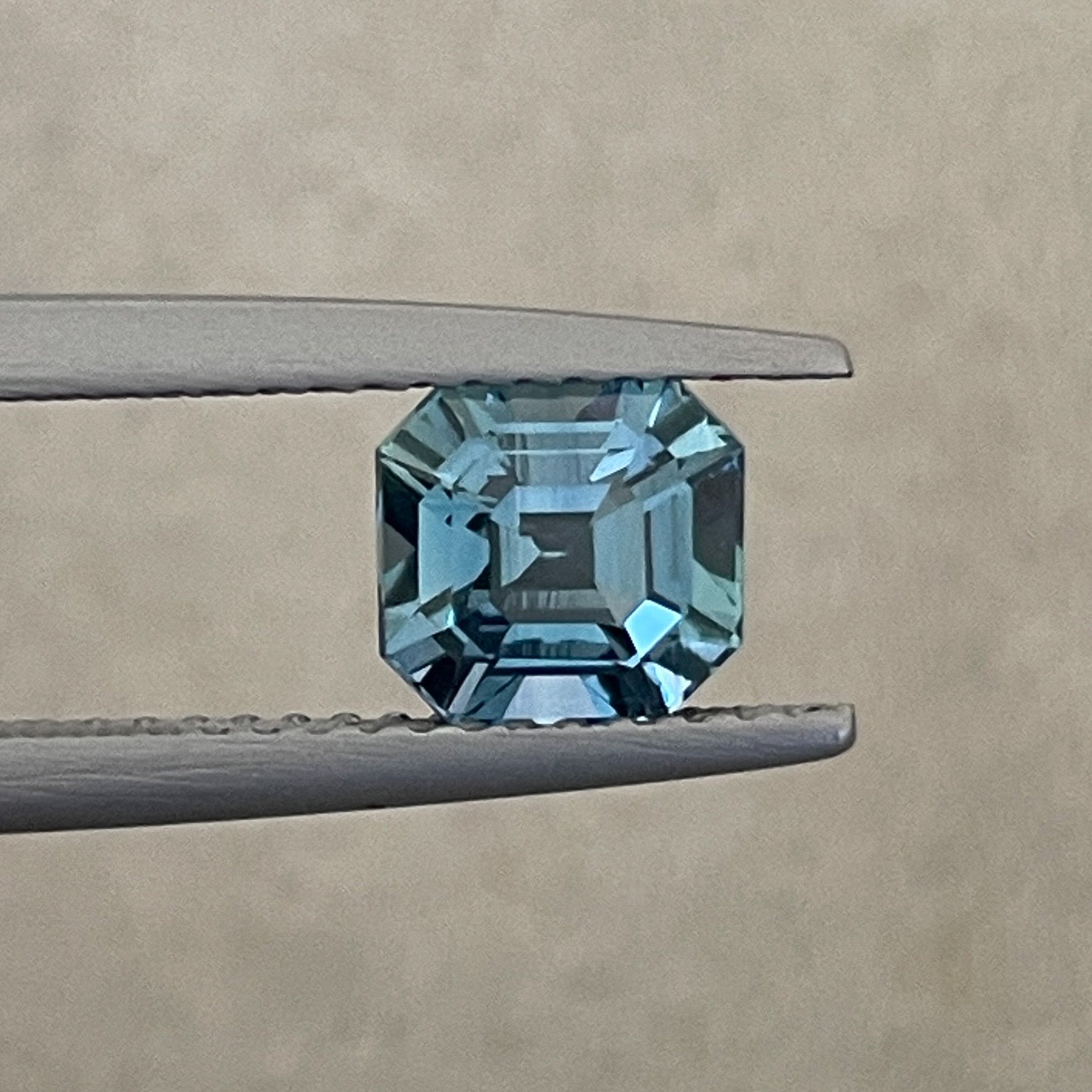 Natural teal sapphire, 1.76 Ct Asscher octagon cut, heat treated loose gemstone by NASHGEMS for engagement or custom jewelry.
