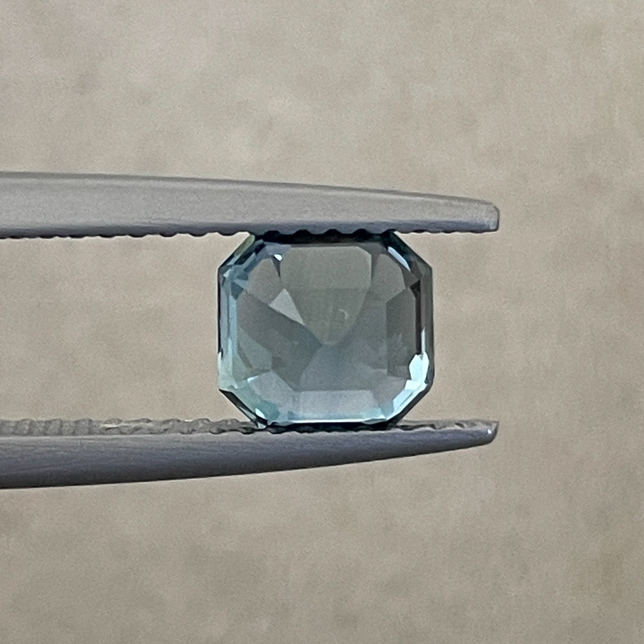 Natural teal sapphire 1.76 ct Asscher octagon cut, heat-treated loose gemstone by NASHGEMS for engagement or custom jewelry.
