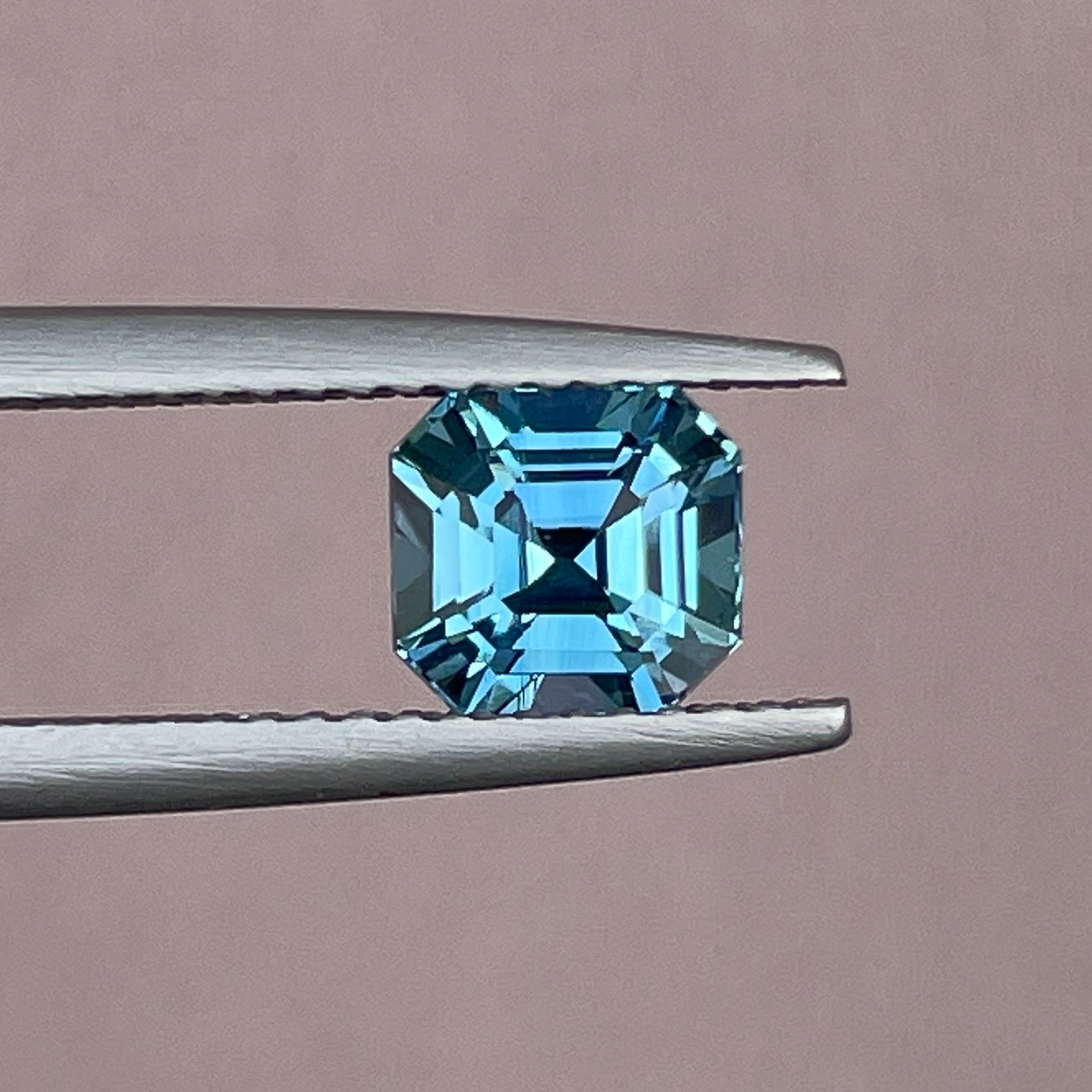 Natural teal sapphire, 1.76 Ct Asscher octagon cut, heat-treated loose gemstone by NASHGEMS for engagement or custom jewelry.