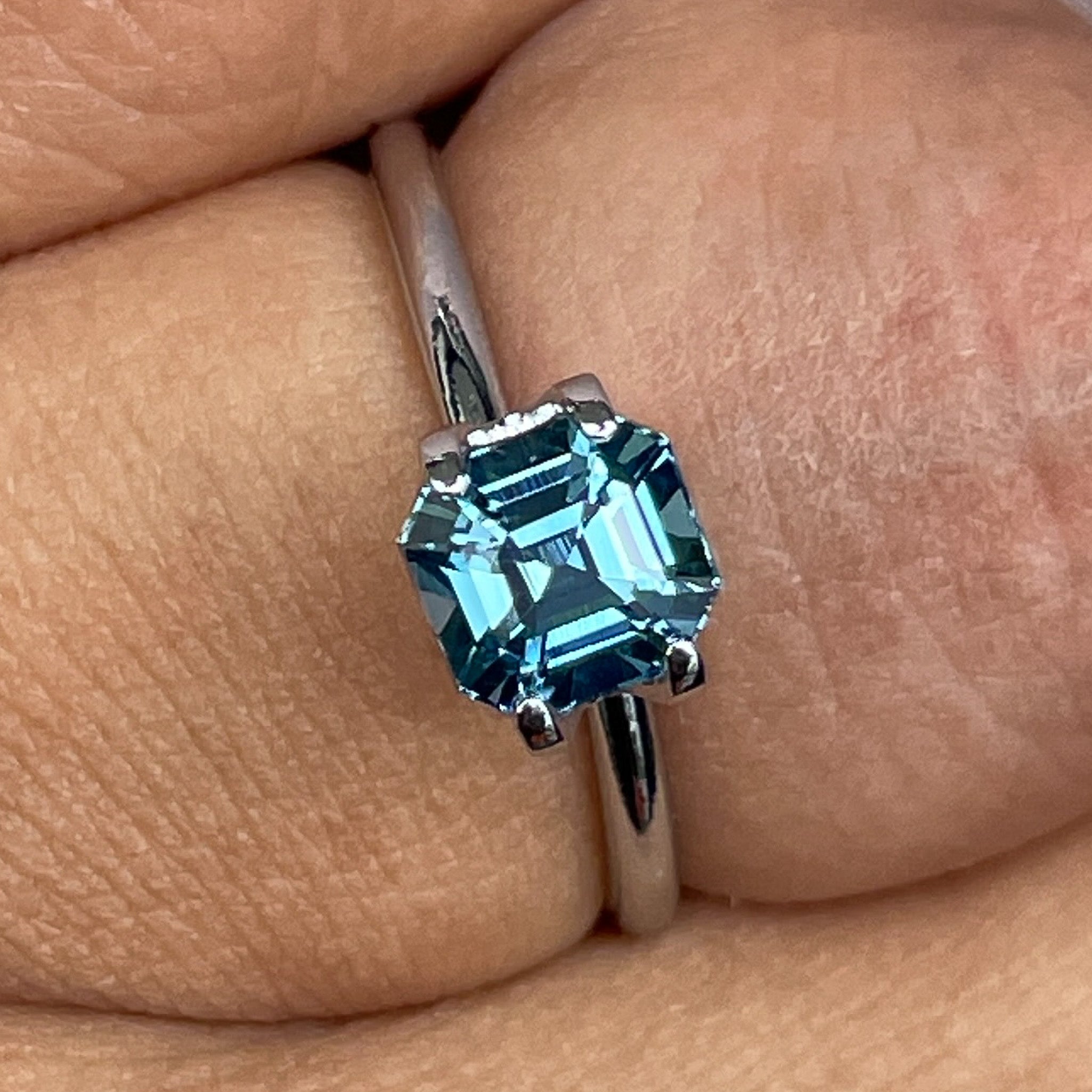 Natural teal sapphire, 1.76 Ct Asscher octagon cut, heat-treated loose gemstone by NASHGEMS for engagement or custom jewelry.
