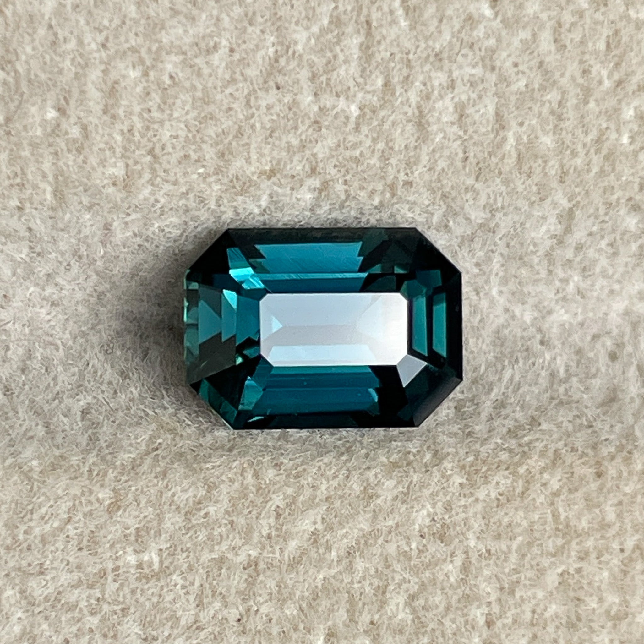 Teal blue-green sapphire 2.18 Ct emerald cut, heat-treated loose gemstone by NASHGEMS for engagement or custom jewelry.