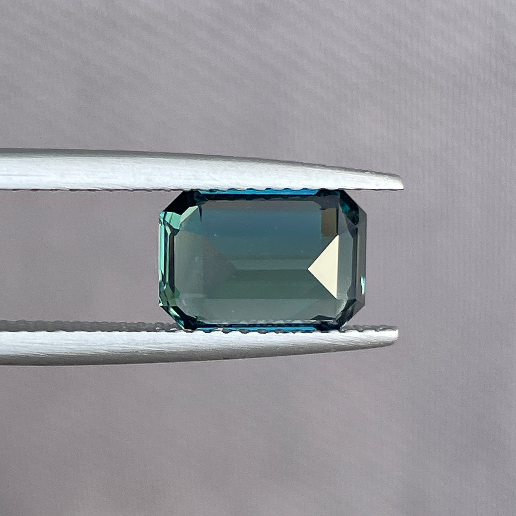 Natural teal blue-green sapphire, 3.71 Ct emerald cut loose gemstone by NASHGEMS, ideal for engagement rings or custom jewelry.