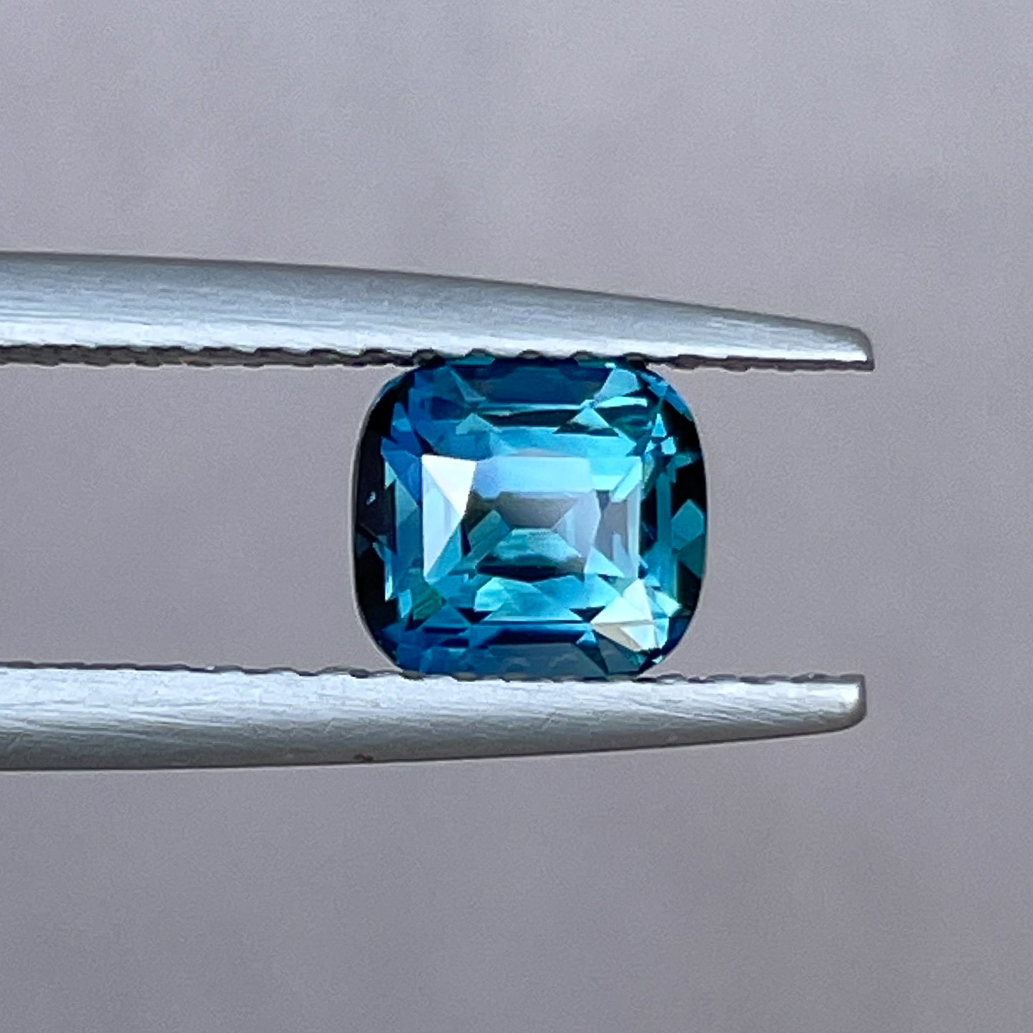 Teal blue sapphire loose cushion cut 1.52 Ct by NASHGEMS, natural no heat sapphire for jewelry or engagement rings.