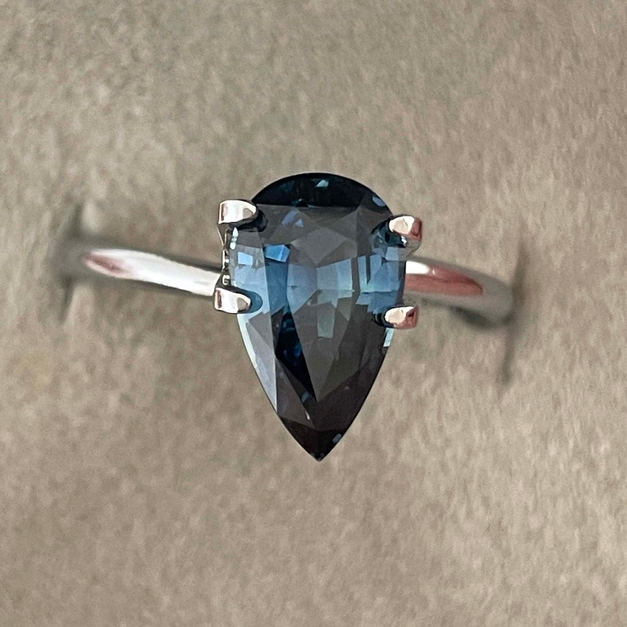 Teal blue-green sapphire pear drop cut 2.15 ct loose gemstone from NASHGEMS, ideal for engagement or wedding jewelry.