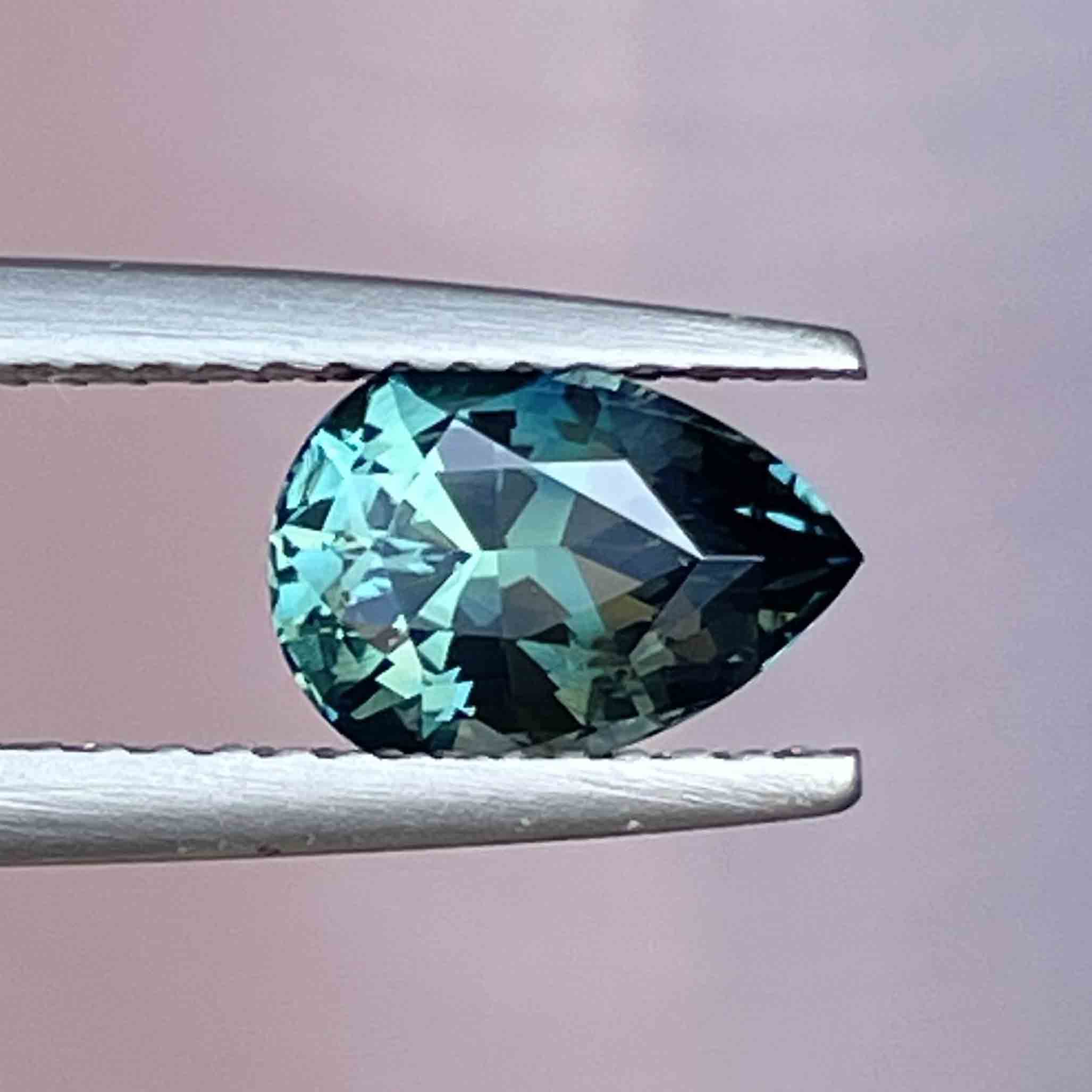 Natural teal blue green sapphire 1.57 Ct pear-shaped loose gemstone from NASHGEMS, perfect for custom engagement rings.