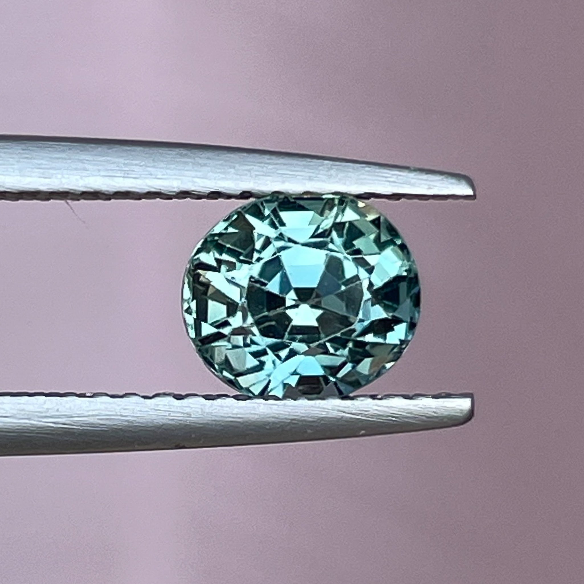 Natural teal sapphire loose stone, 1.65 Ct oval cut by NASHGEMS, ideal for engagement rings or custom jewelry.