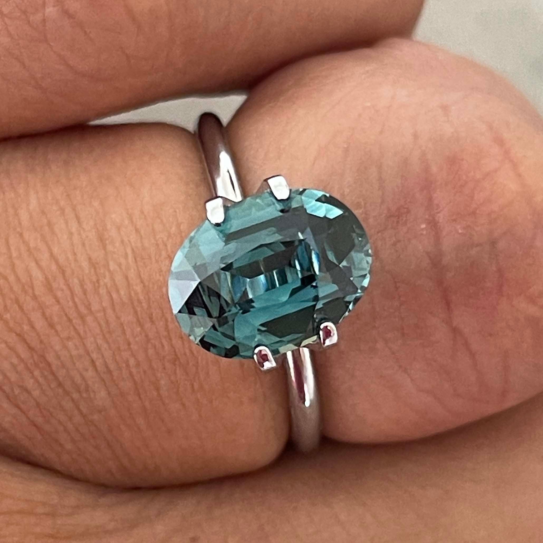 Teal blue green sapphire loose oval cut 3.19 Ct from NASHGEMS, ideal for engagement rings or custom jewelry.