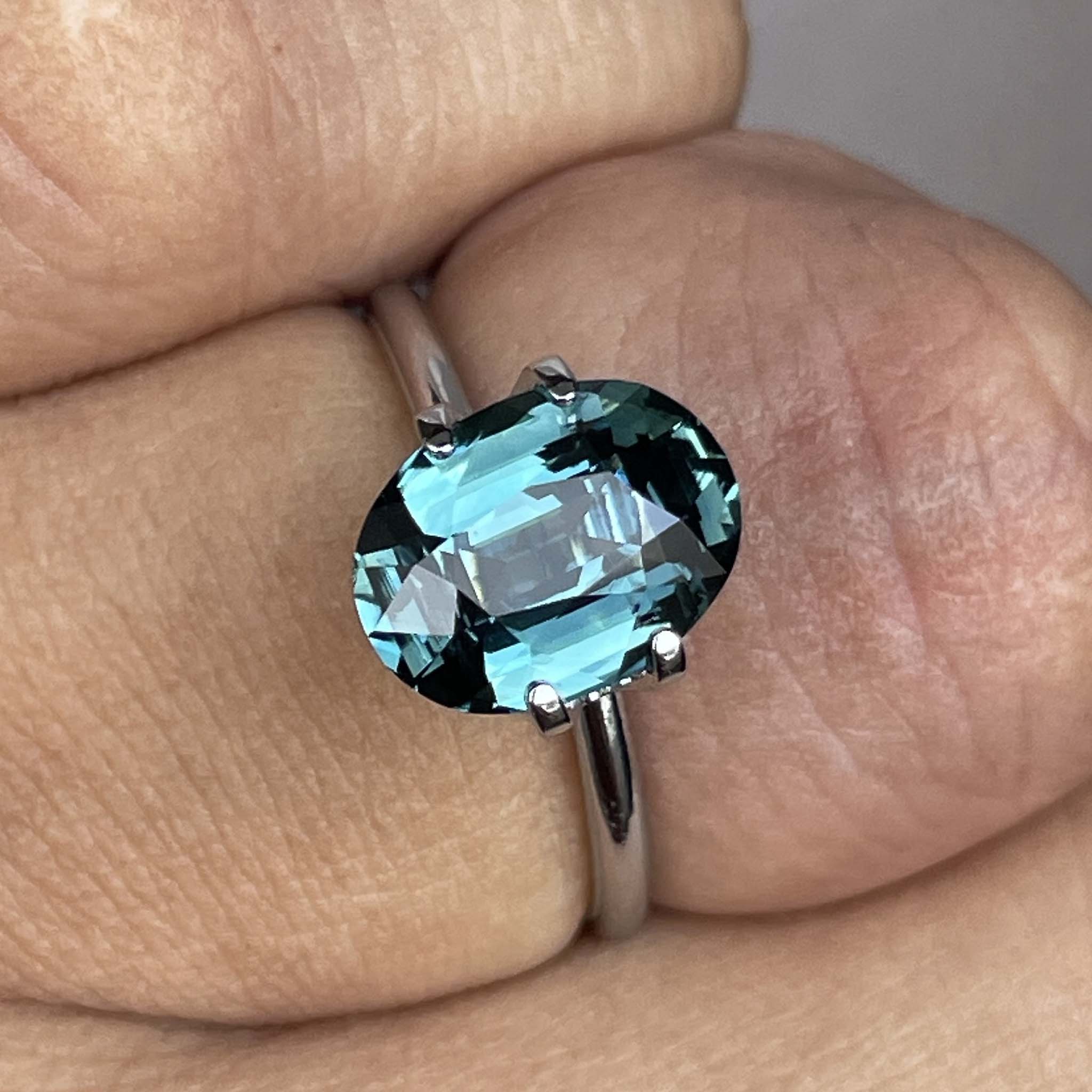 Natural teal blue-green sapphire loose stone, 3.19 Ct oval cut by NASHGEMS, ideal for engagement rings or custom jewelry.
