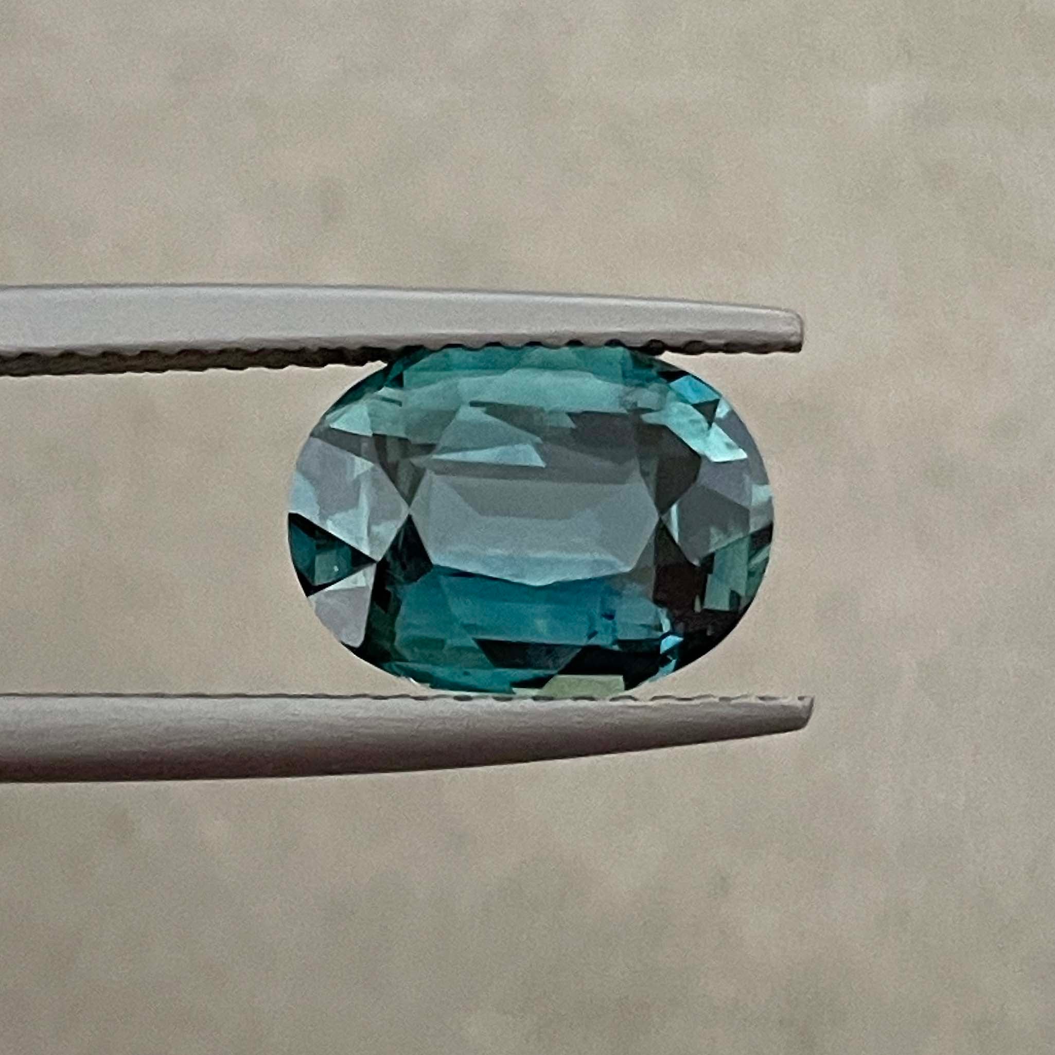Teal blue-green sapphire loose oval cut 3.19 Ct from NASHGEMS, natural no heat sapphire for jewelry or engagement rings.