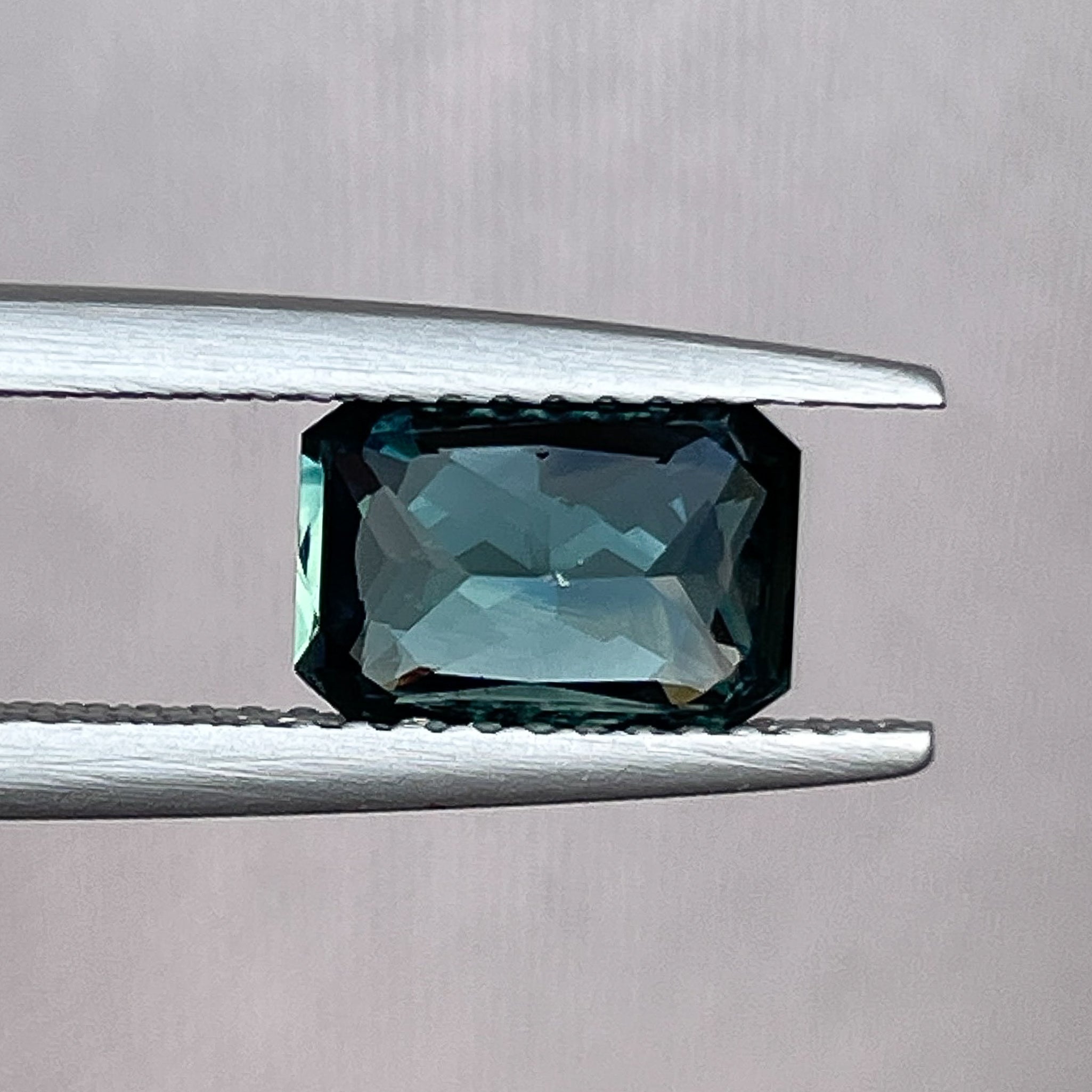 Natural teal blue-green sapphire, 1.71 carats, radiant cut, loose gemstone by NASHGEMS, suitable for engagement or custom jewelry