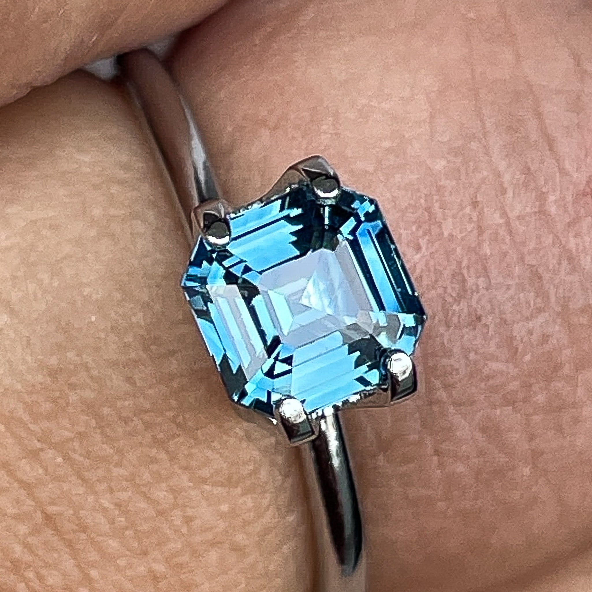 Natural teal blue sapphire loose gemstone, 1.52 Ct emerald cut by NASHGEMS, ideal for engagement rings or custom jewelry.